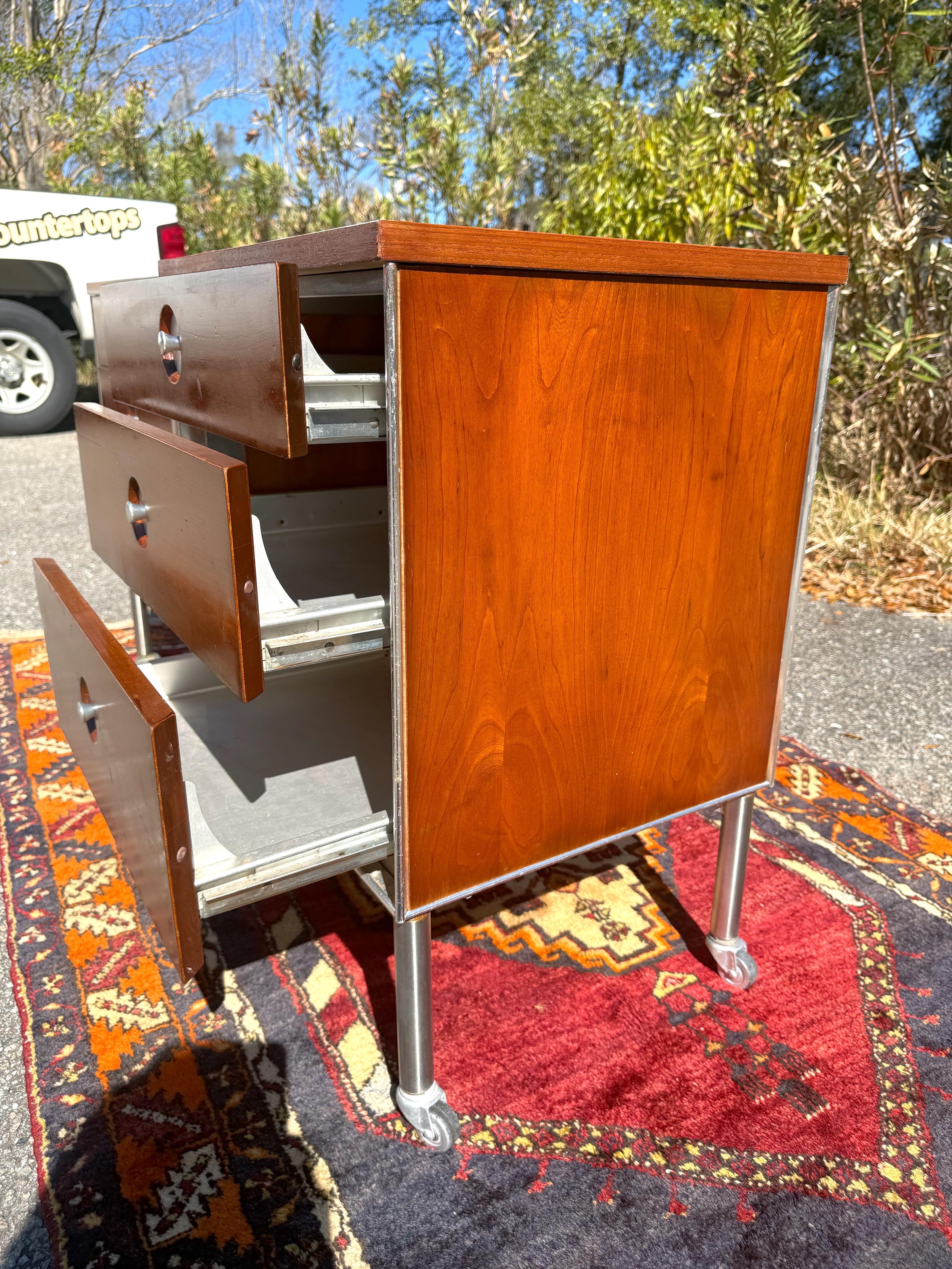 20th Century A pair 1950s Raymond Loewy Industrial Rolling 3 Drawer Nightstands or End Tables For Sale