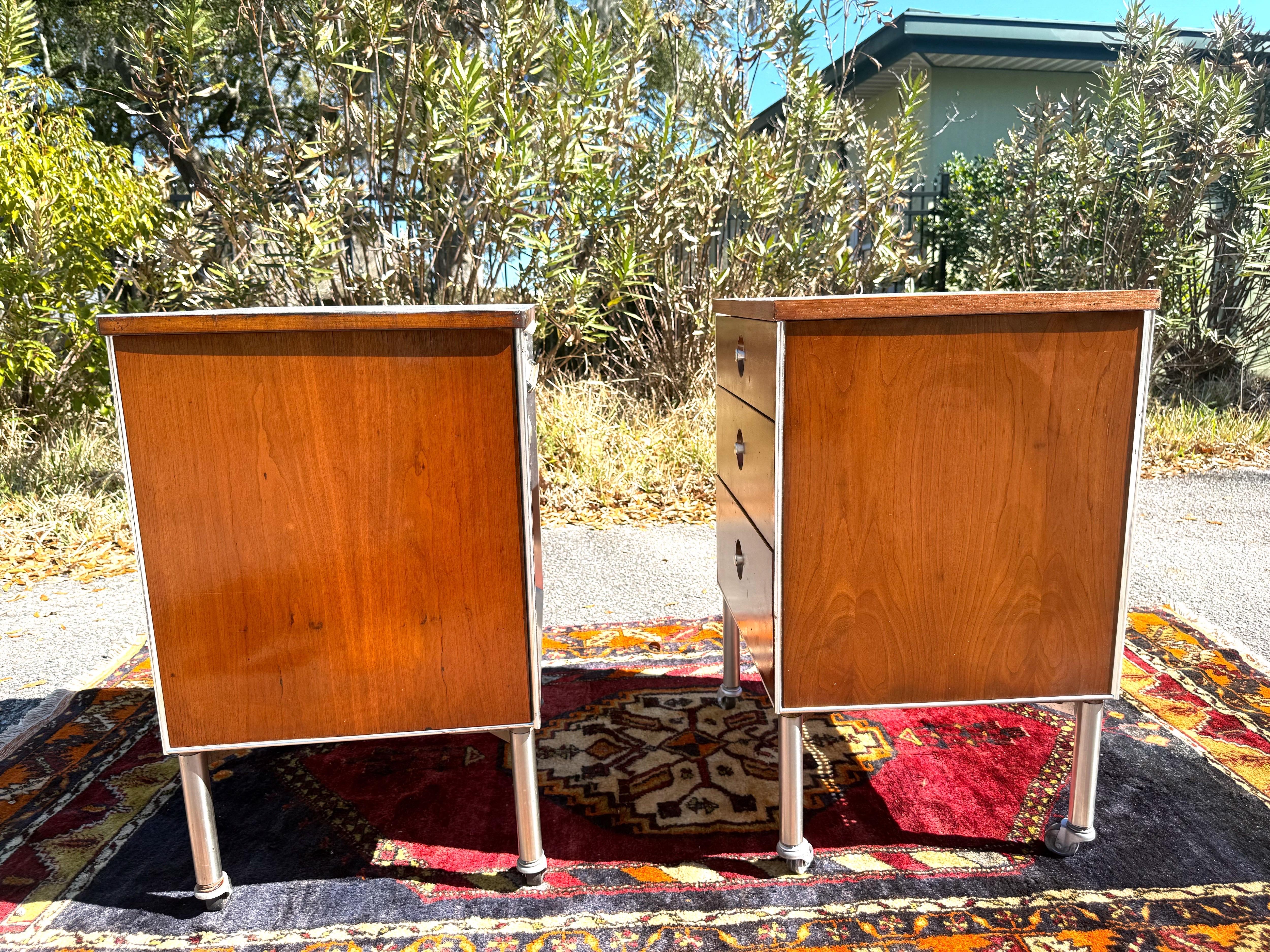 A pair 1950s Raymond Loewy Industrial Rolling 3 Drawer Nightstands or End Tables For Sale 1