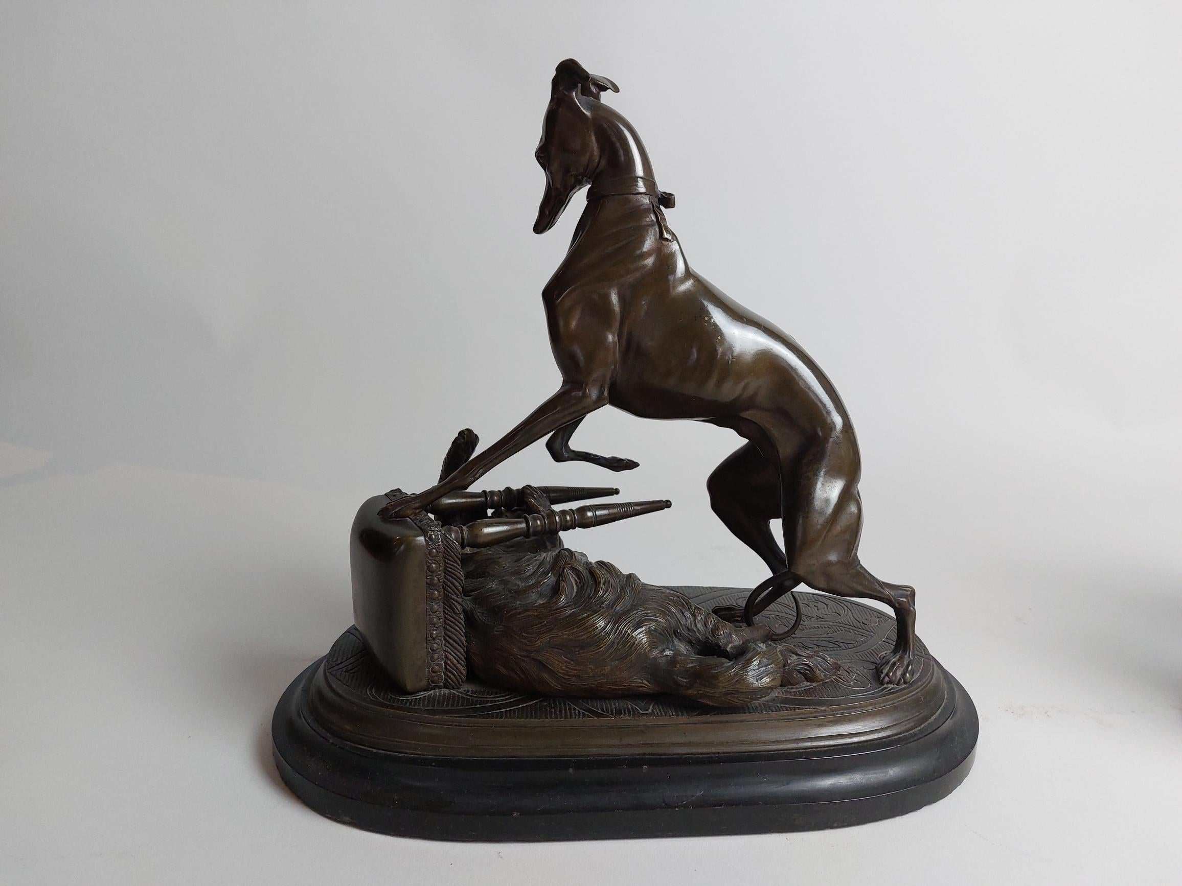 Ein Paar bronzene Hundeskulpturen aus dem 19. Jahrhundert 