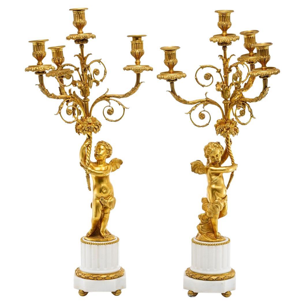 A pair (2) of figural candelabra in the Louis XVI style.