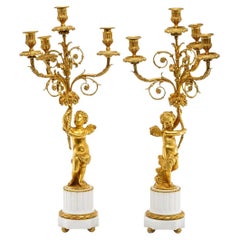 A pair (2) of figural candelabra in the Louis XVI style.