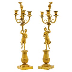 A pair (2) of figural Empire candelabra candles. Paris, 19th century.