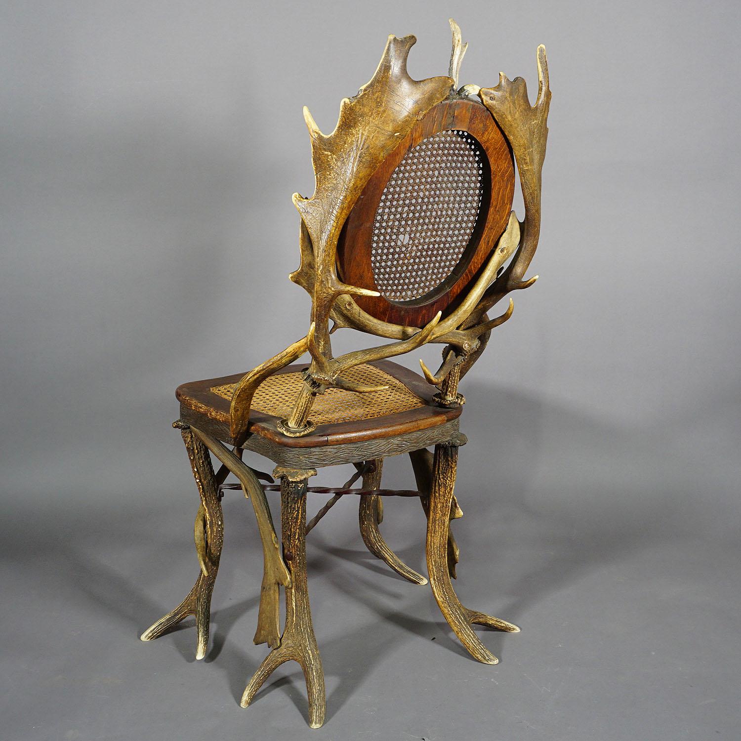 Bois cerf Paire de fauteuils de salon anciens rustiques en bois de cervidé, Allemagne, vers 1900 en vente