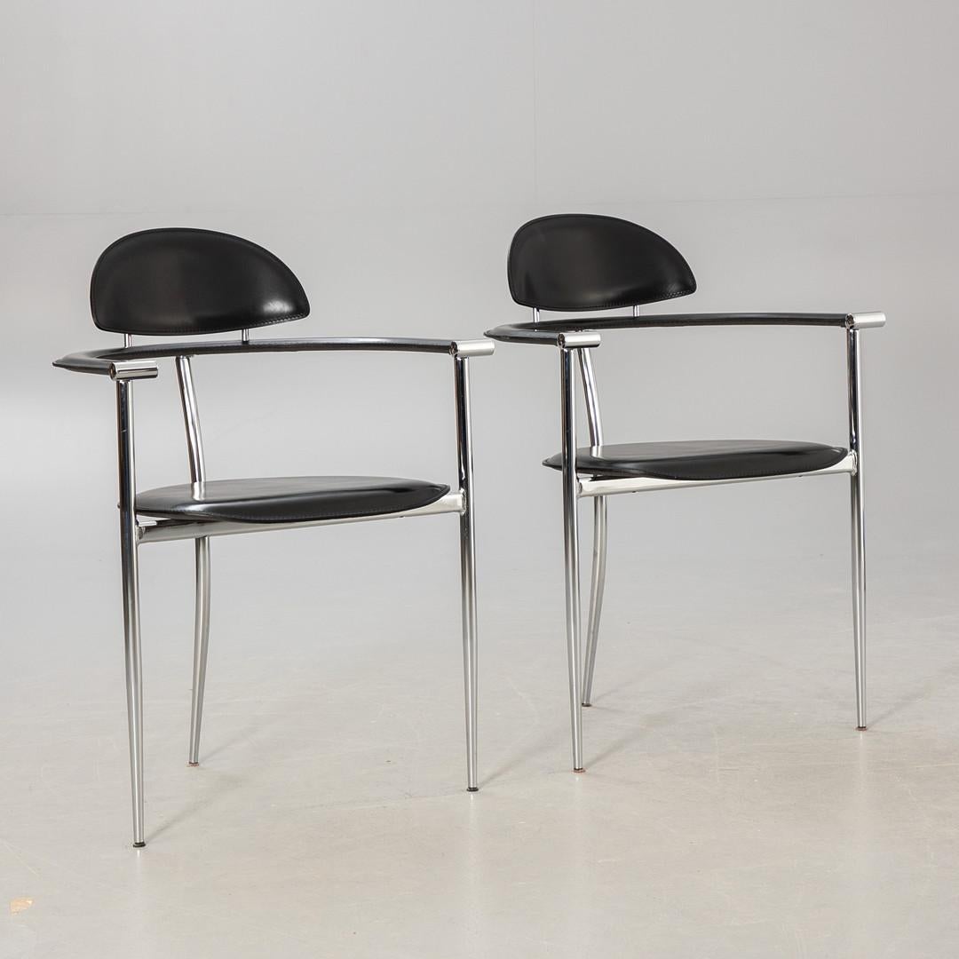 Arrben Italy armchairs, chromed metal frame, upholstered with patinated black leather. Seat height 46 cm. Produced by Arrben Design, Italy. 
2 pieces available price for 2