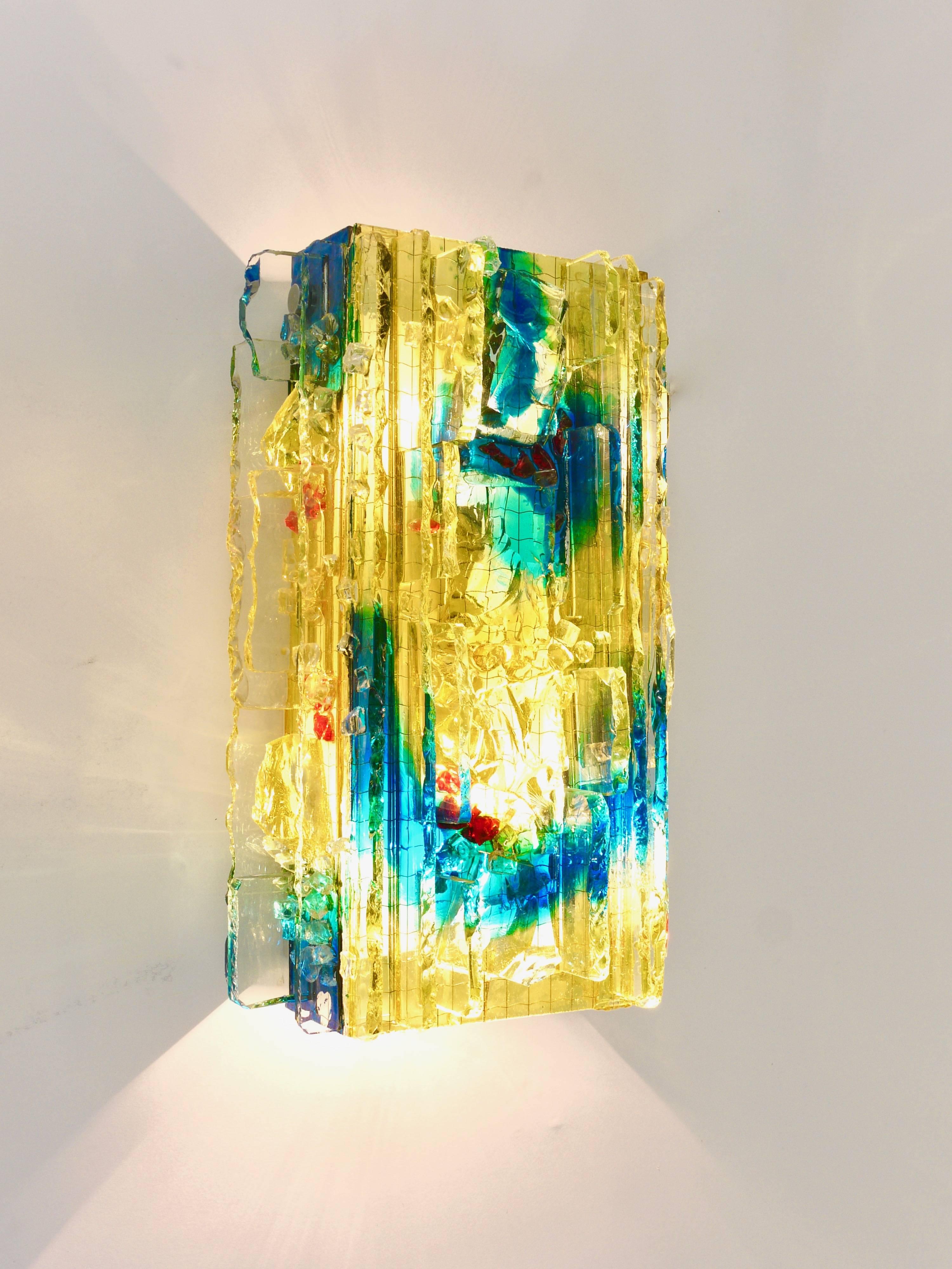 A beautiful pair of colorful Art glass wall lights from the 1960s, designed by A. Lankhorst, executed RAAK Amsterdam. Stunning lights, consisting of handmade, square multi-colored glass collage lampshades, on a white metal base, each light offers