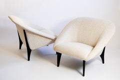 A pair cream fabric «Lido» armchairs by Arne Norell for Westbergs Möbler AB