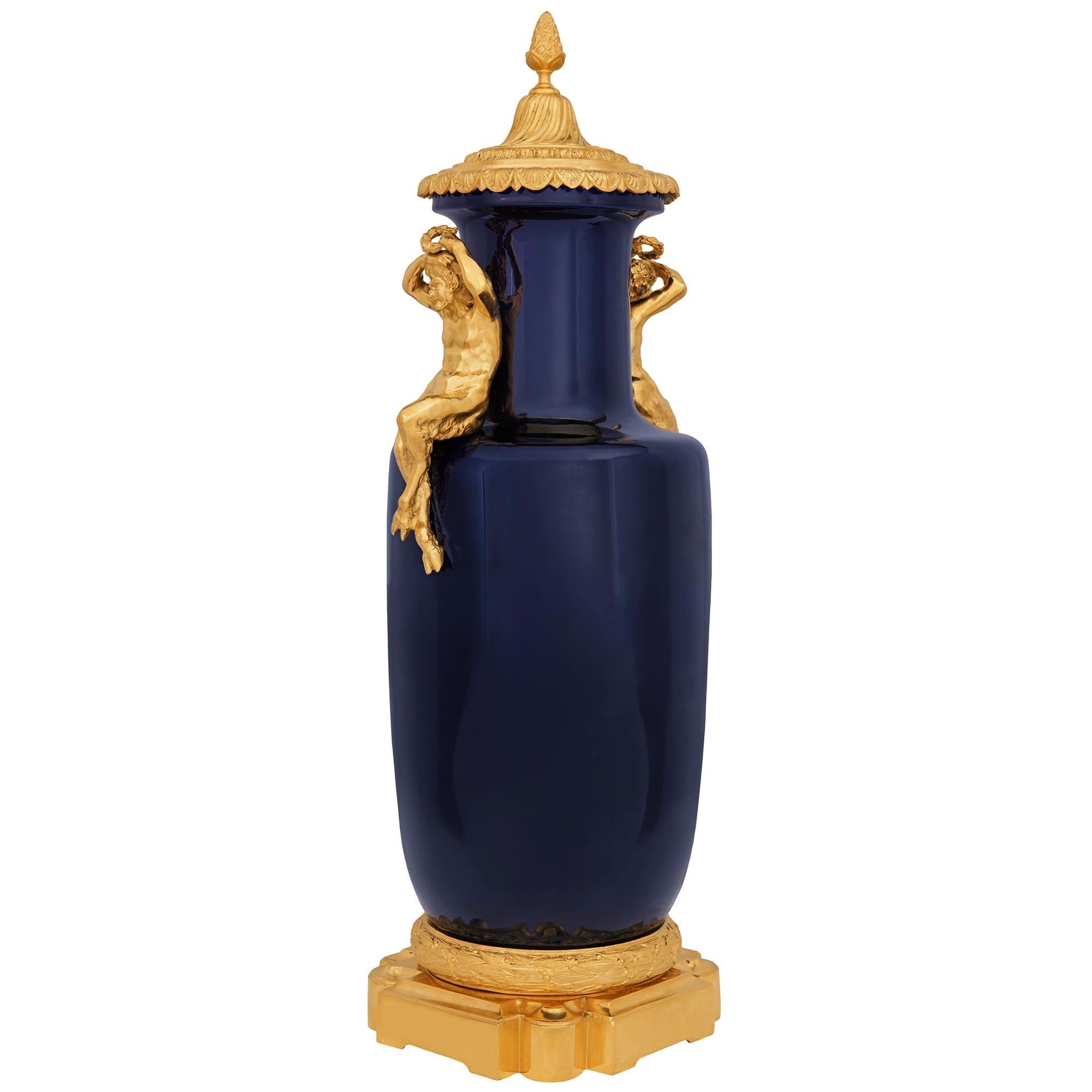 A pair French 19th century Louis XVI st. Sévres Porcelain and Ormolu urns In Good Condition For Sale In West Palm Beach, FL