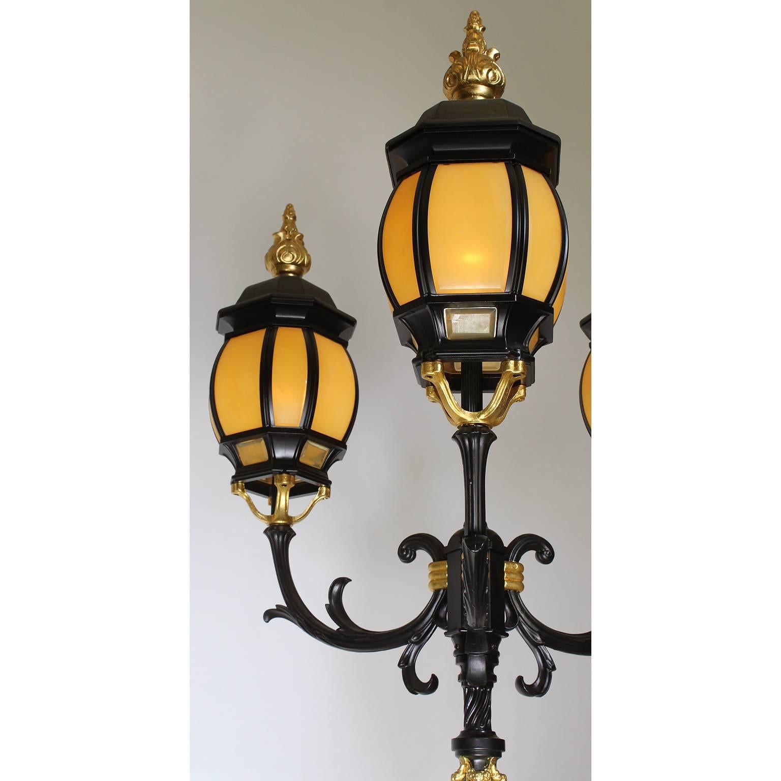 Neoclassical Revival Pair French 19th-20th Century Neoclassical Style Iron and Parcel-Gilt Torcheres  For Sale