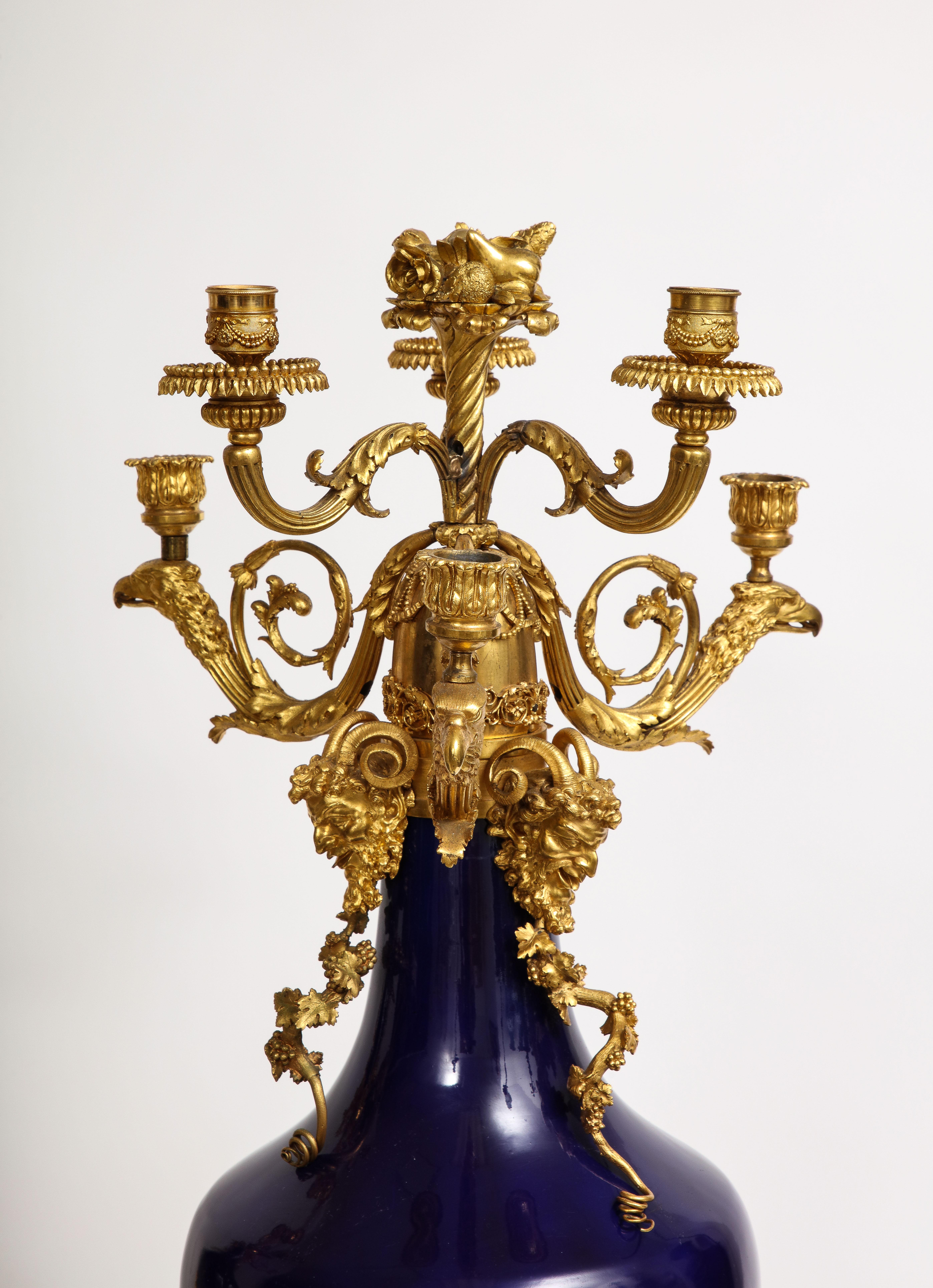 Hand-Carved A Pair French Ormolu Mounted Blue Porcelain Candelabras, Att. Henry Dasson For Sale
