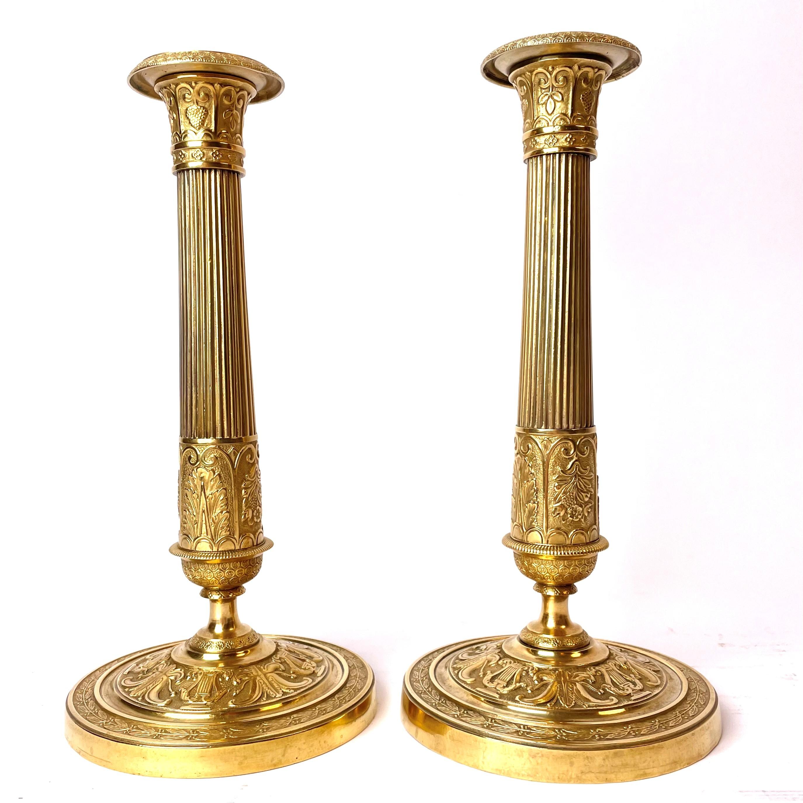 A pair beautiful gilt bronze candlesticks signed by Pierre-Jules Mene (1810-1879) (see pictures). Probably made in 1830s. Decorated with harps, flowers, leaves and grapes.


Wear consistent with age and use.