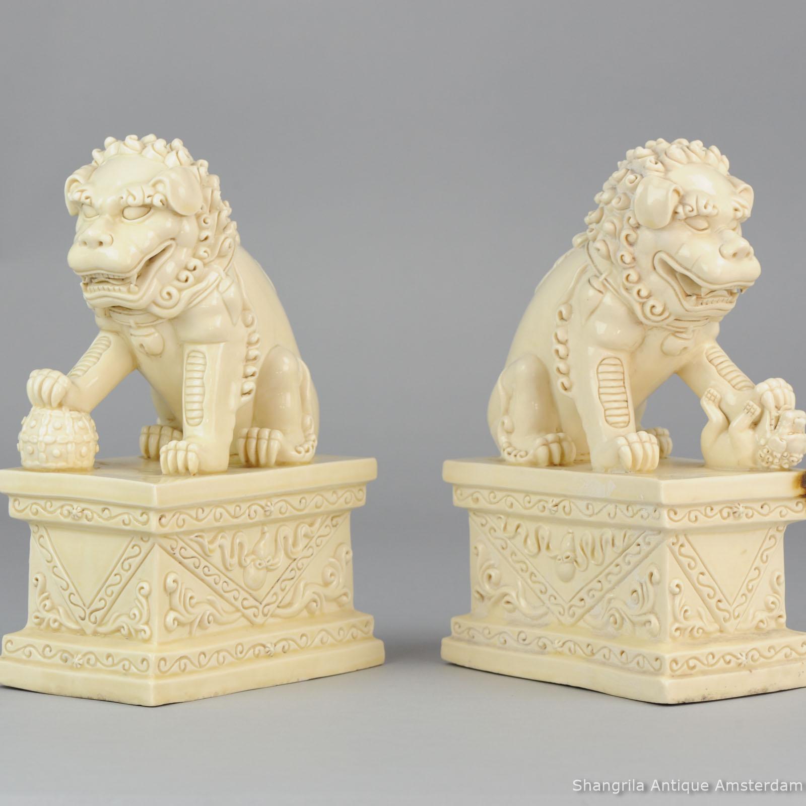Porcelain Pair of Large Marked Blanc de Chine Foo Dogs PRoC Period Dehua Chinese For Sale