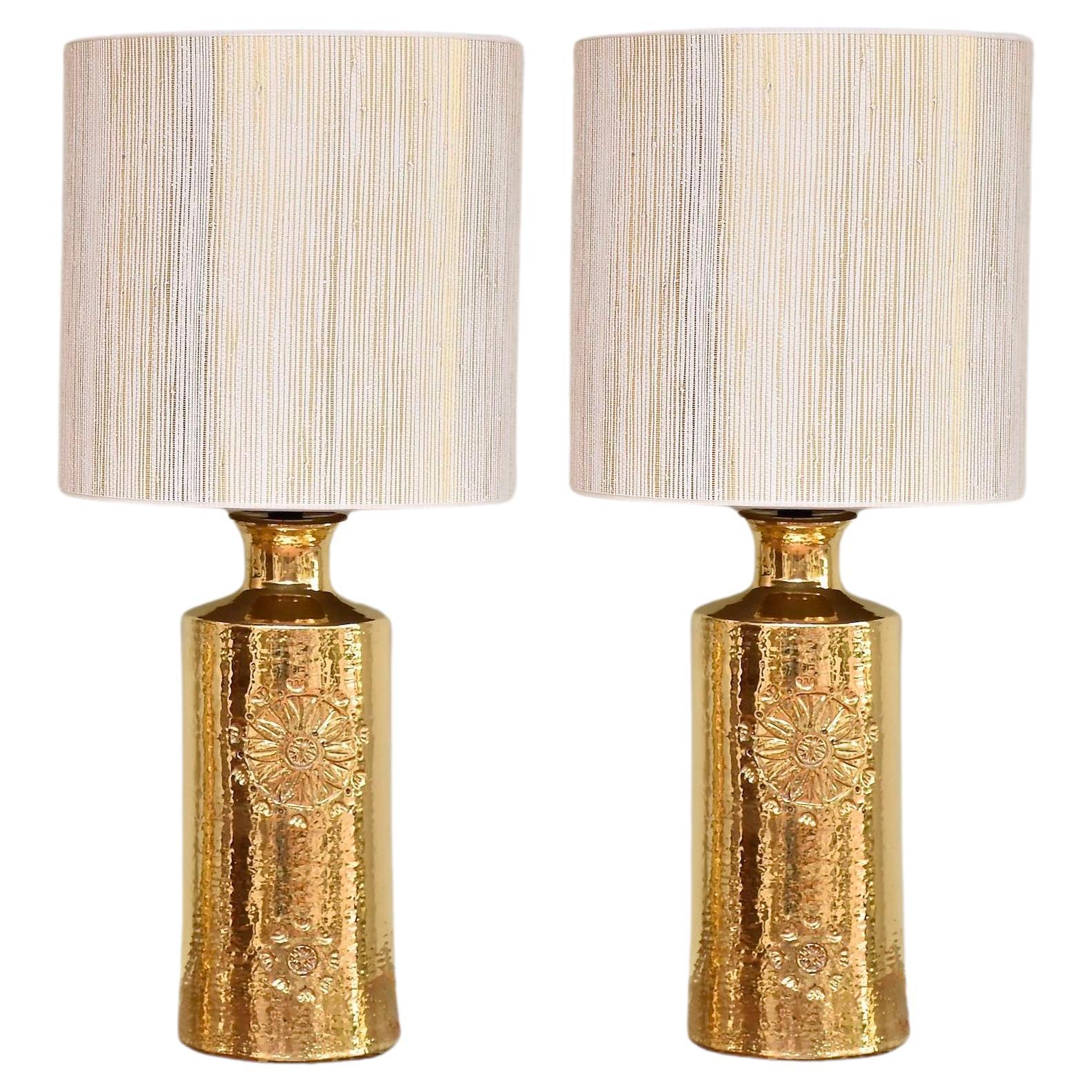 A pair mid-century ceramic gold glazed table lamps by Bitossi for Bergboms