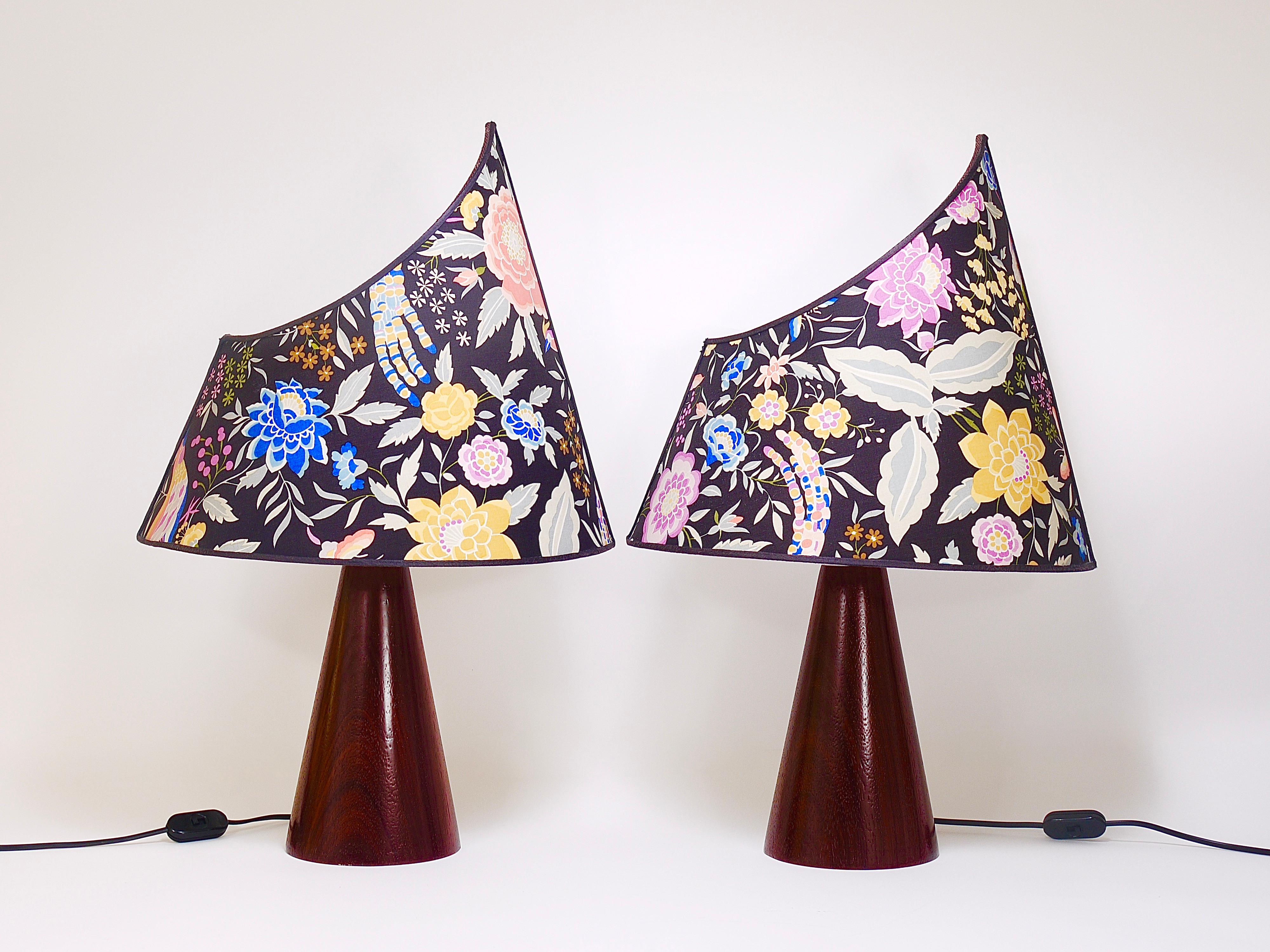 An amazing pair of colorful postmodern Missoni table or side lamps, nightstand lights from the 1980s, designed by Massimo Valloto. This light has an unusual conical base made of dark wood and an asymmetrical lampshade in the shape of a sail with a
