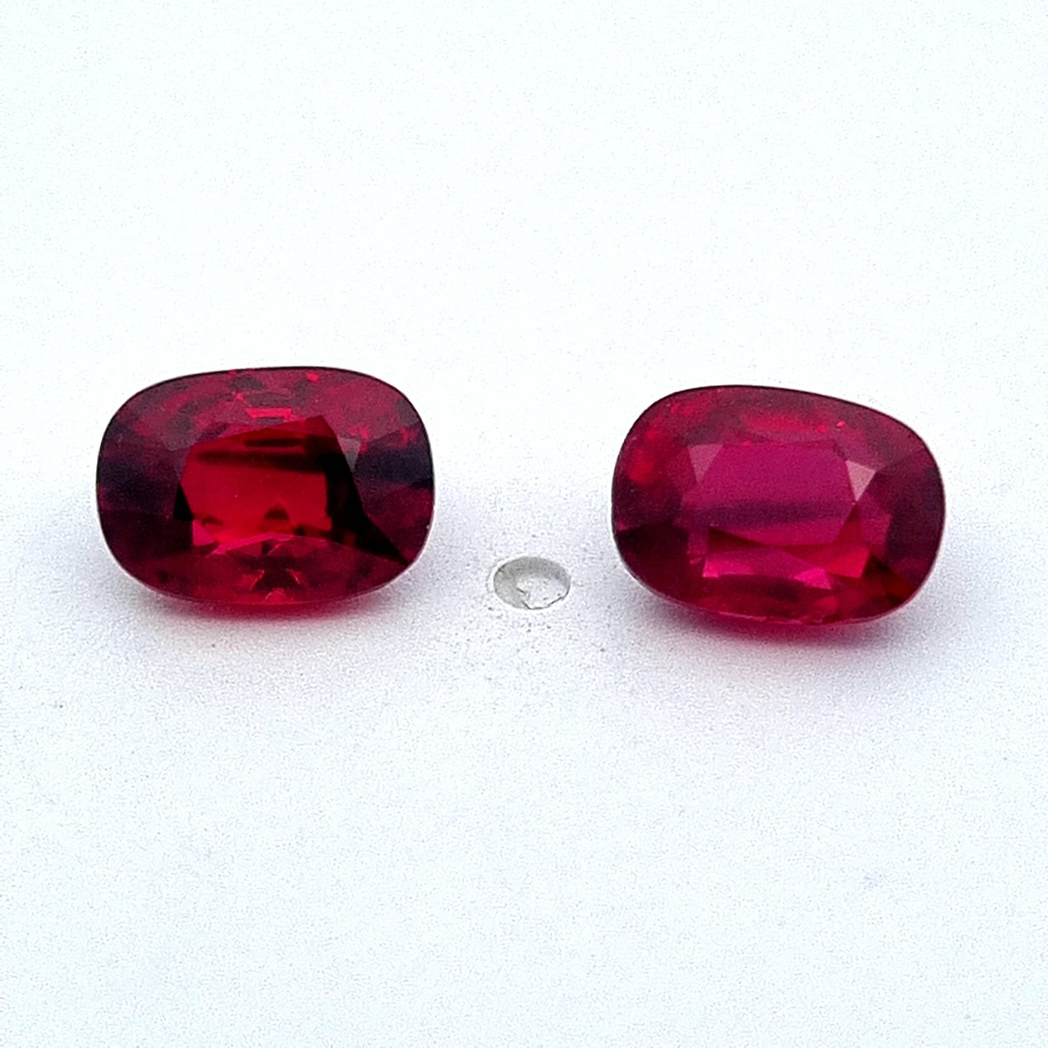 A fine pair of 1 carat each 'Pigeons Blood' unheated rubies. 

These Cushion cut rubies are certified by the GRS as originating from Burma (Myanmar) with no thermal enhancement (unheated), and have the prestigious color grade of 'Pigeons Blood'