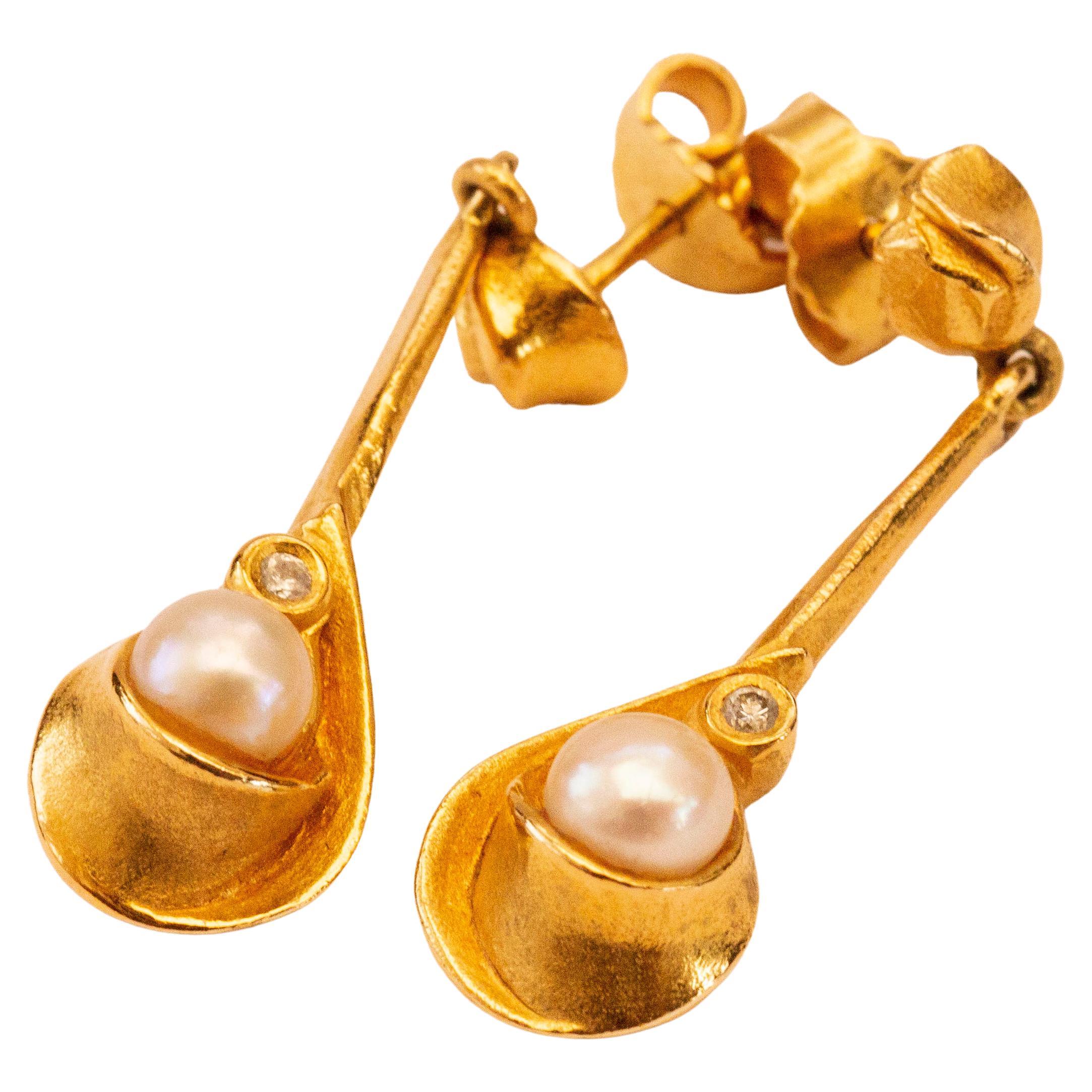 A Pair of 14 Karat Yellow Gold Earrings with Akoya Pearl and Diamond For Sale