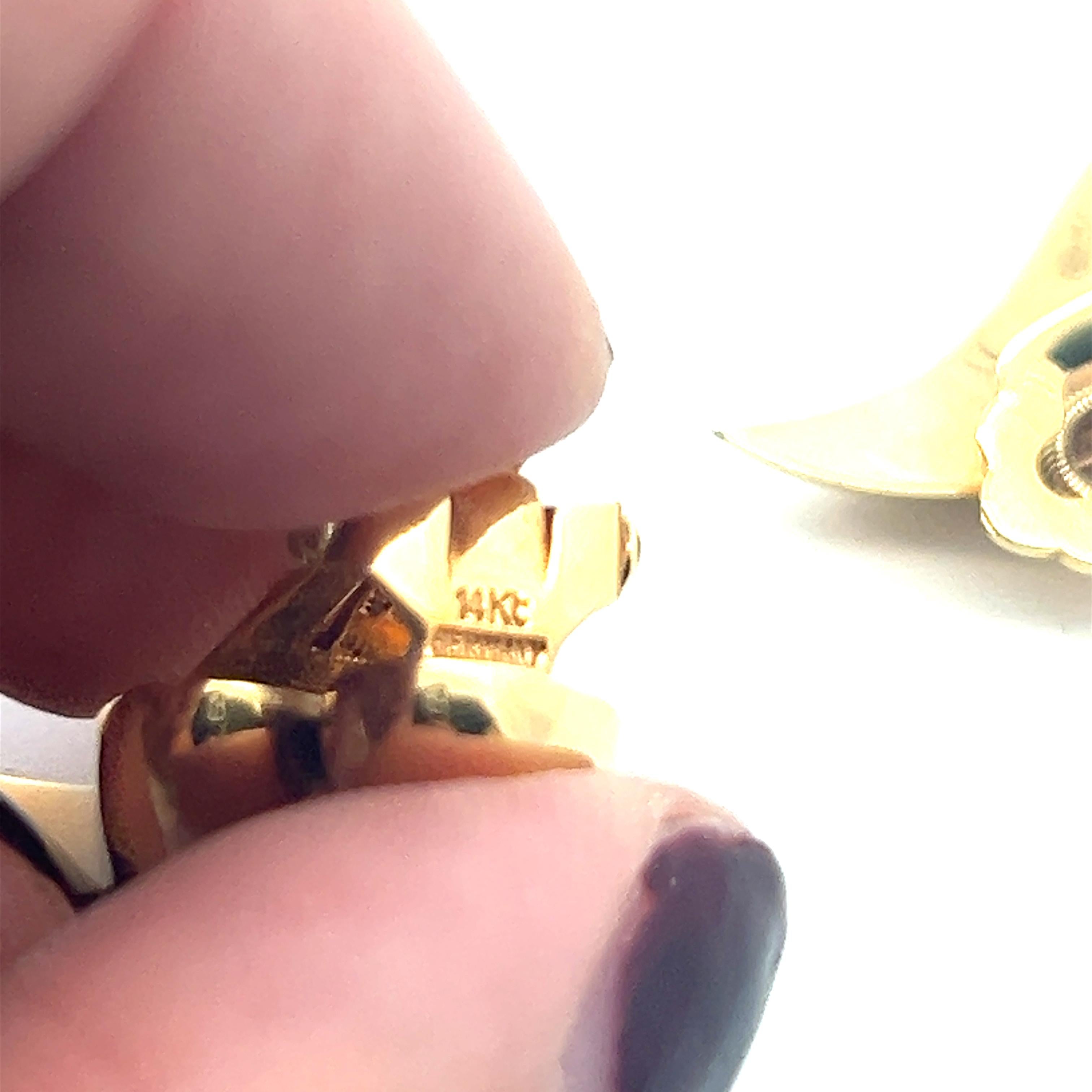 A pair of 14k yellow gold ear clips by Tiffany & Co. 6