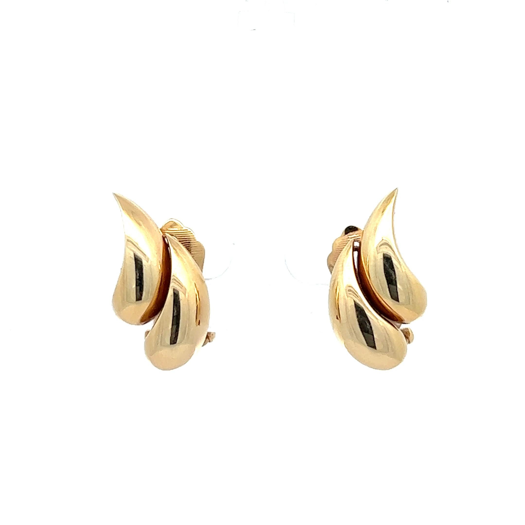 A pair of 14k yellow gold ear clips by Tiffany & Co.

Origin: Germany.
Age: circa 1980.
Measurements: circa 2.7 cm long.
Weight: circa 10.6 grams together.
Hallmarks: Signed: Tiffany & Co. 
Stamped with 