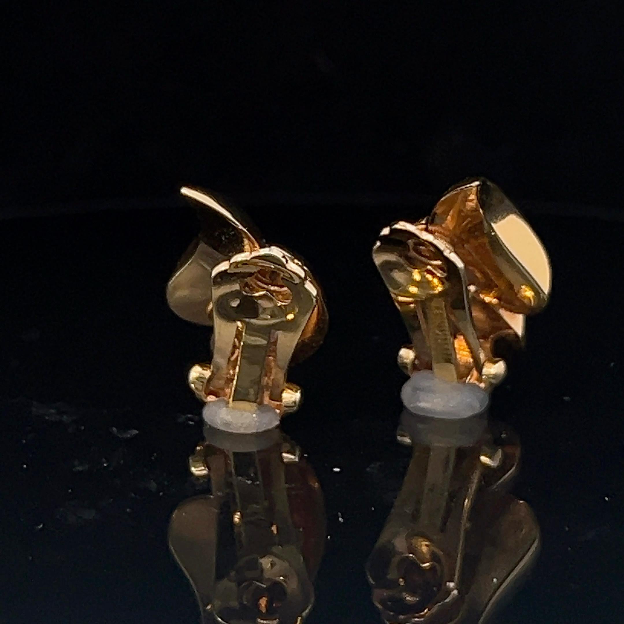 A pair of 14k yellow gold ear clips by Tiffany & Co. 4
