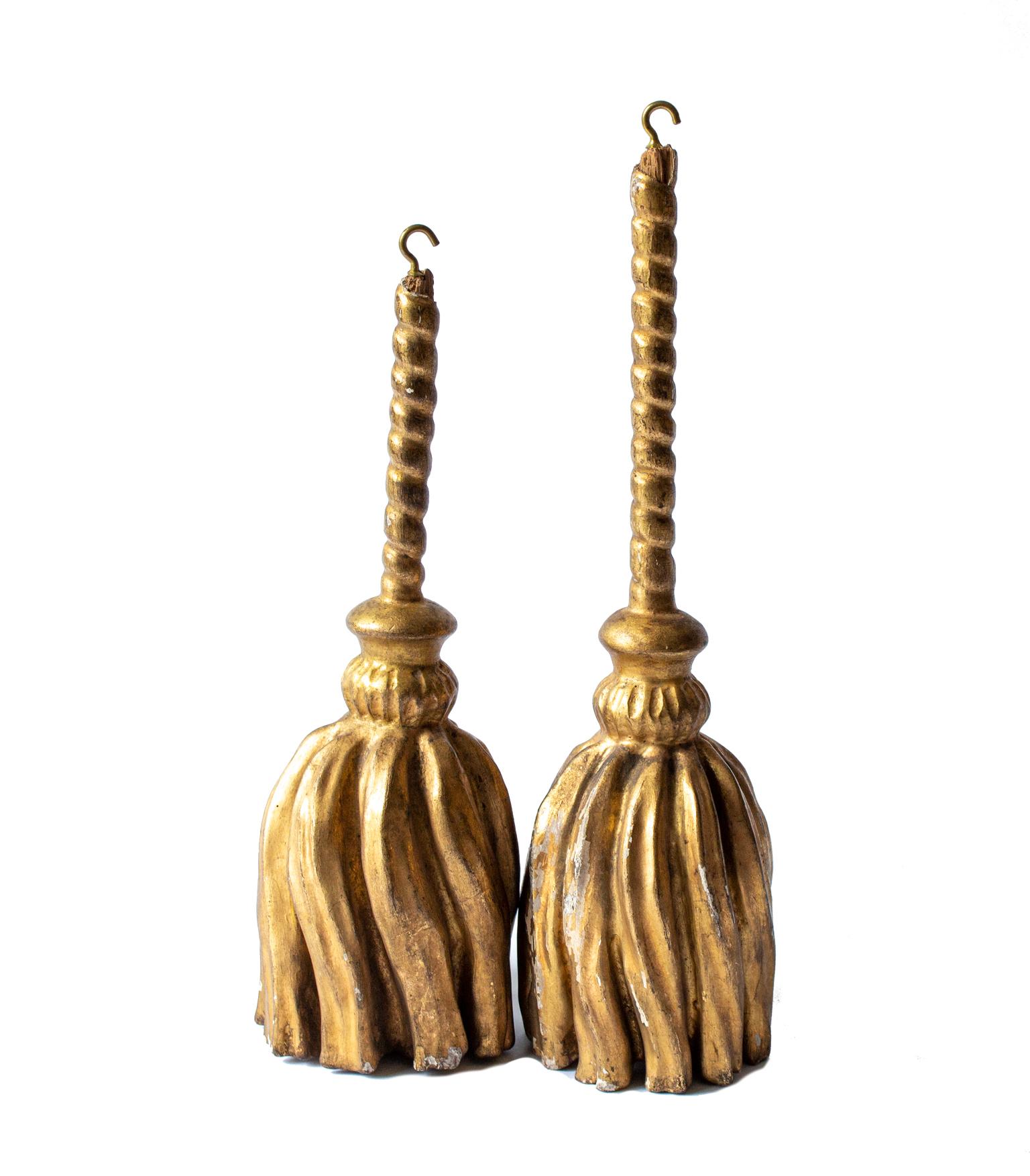 Pair of Gustavian 17th century carved antique Swedish Gustavian gilt tassels. The tassels are hand carved and thus different, but similar. Originally utilized not only as drapery accents but, also furniture decor, too. These were often used from the