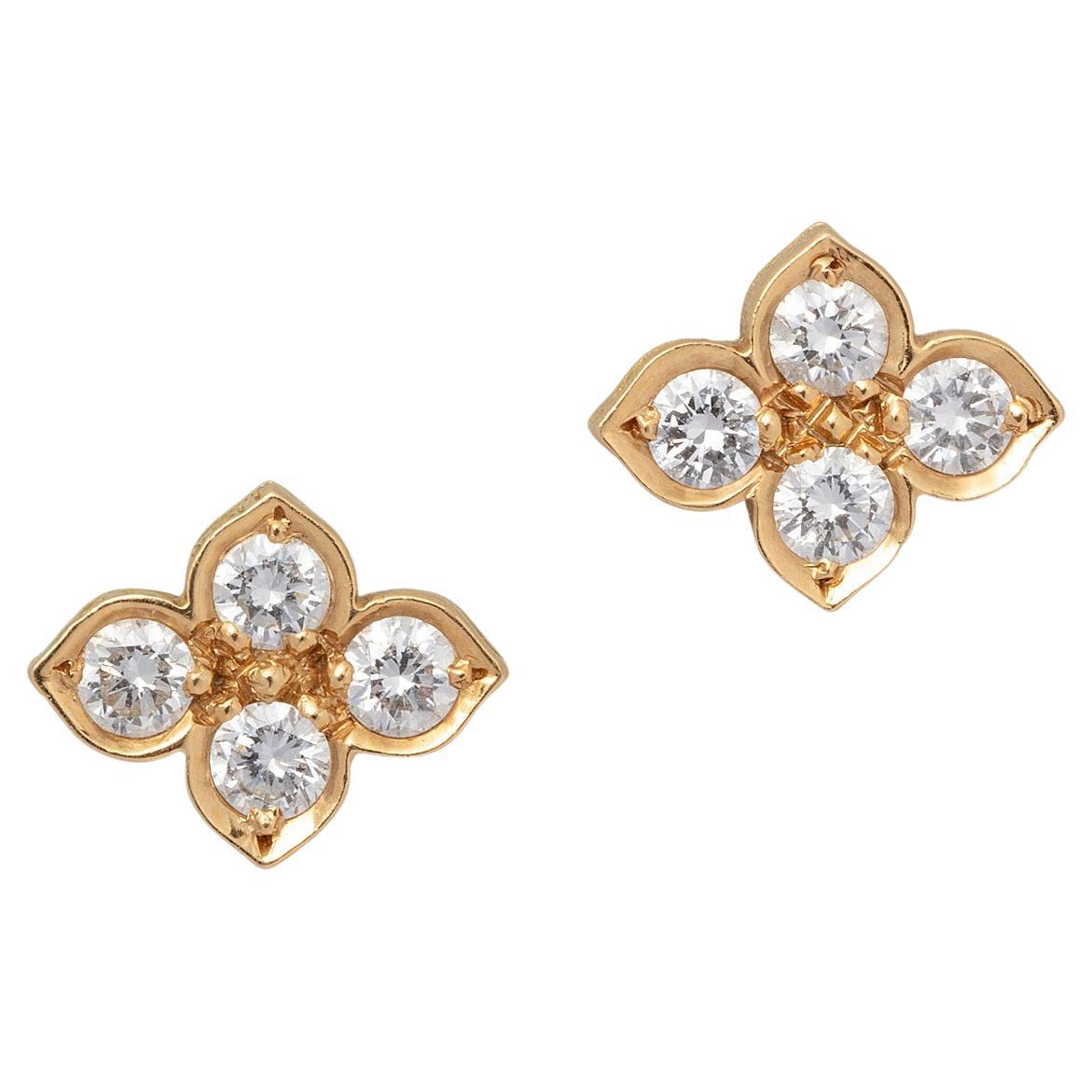 A Pair of 18 Carat Gold and Diamond Cartier Flower Stud Earrings