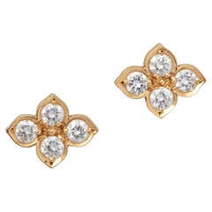 A Pair of 18 Carat Gold and Diamond Cartier Flower Stud Earrings