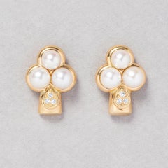 A pair of 18 Carat Gold Clover Earrings with Pearls and Diamonds