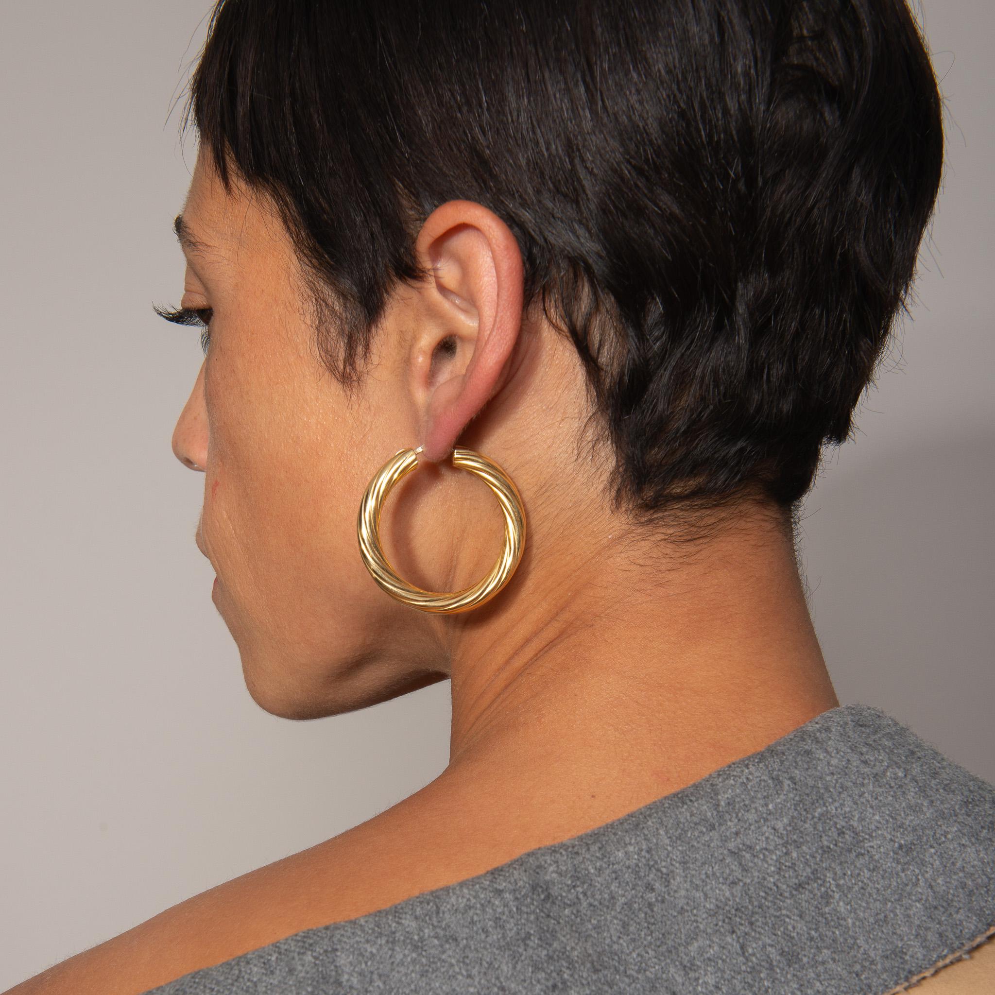 Women's or Men's A pair of 18 Carat Gold Fred Paris Hoop Earrings For Sale