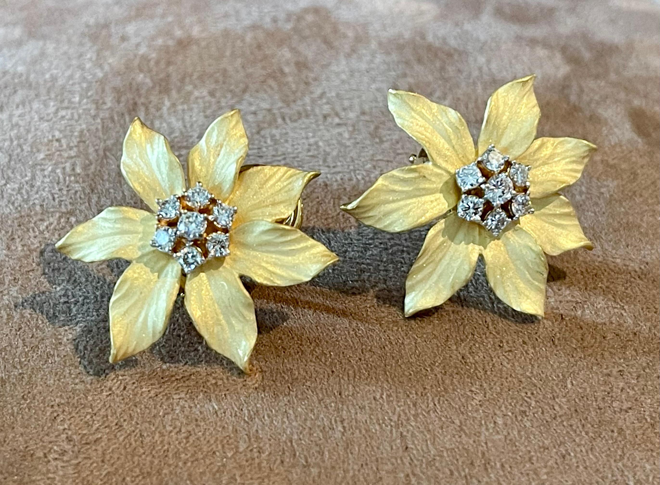 Contemporary A pair of 18 K yellow brushed Gold flower Diamond earrings For Sale