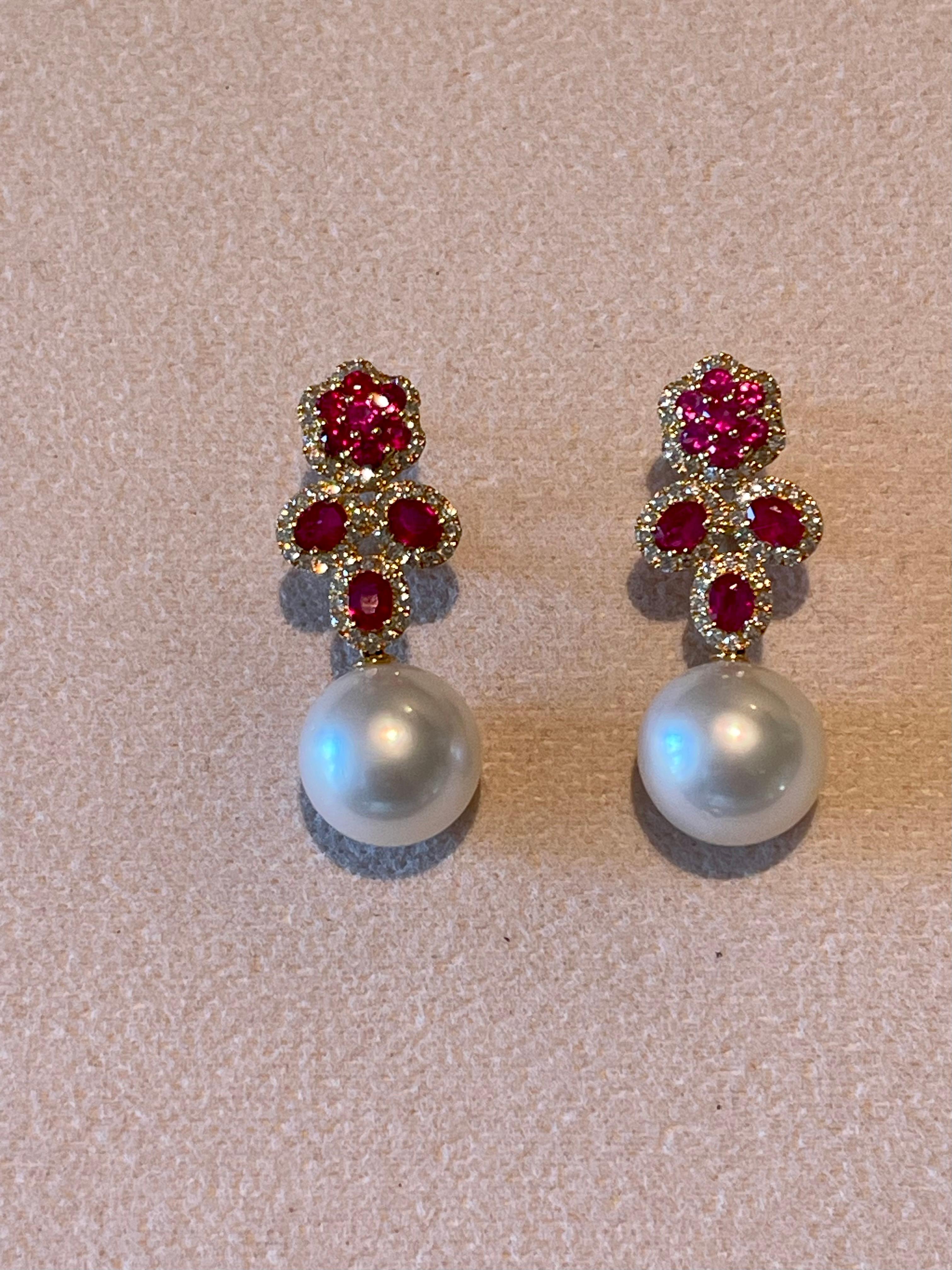 Women's A pair of 18 K yellow Gold Diamond Ruby South Sea Pearl earrings For Sale