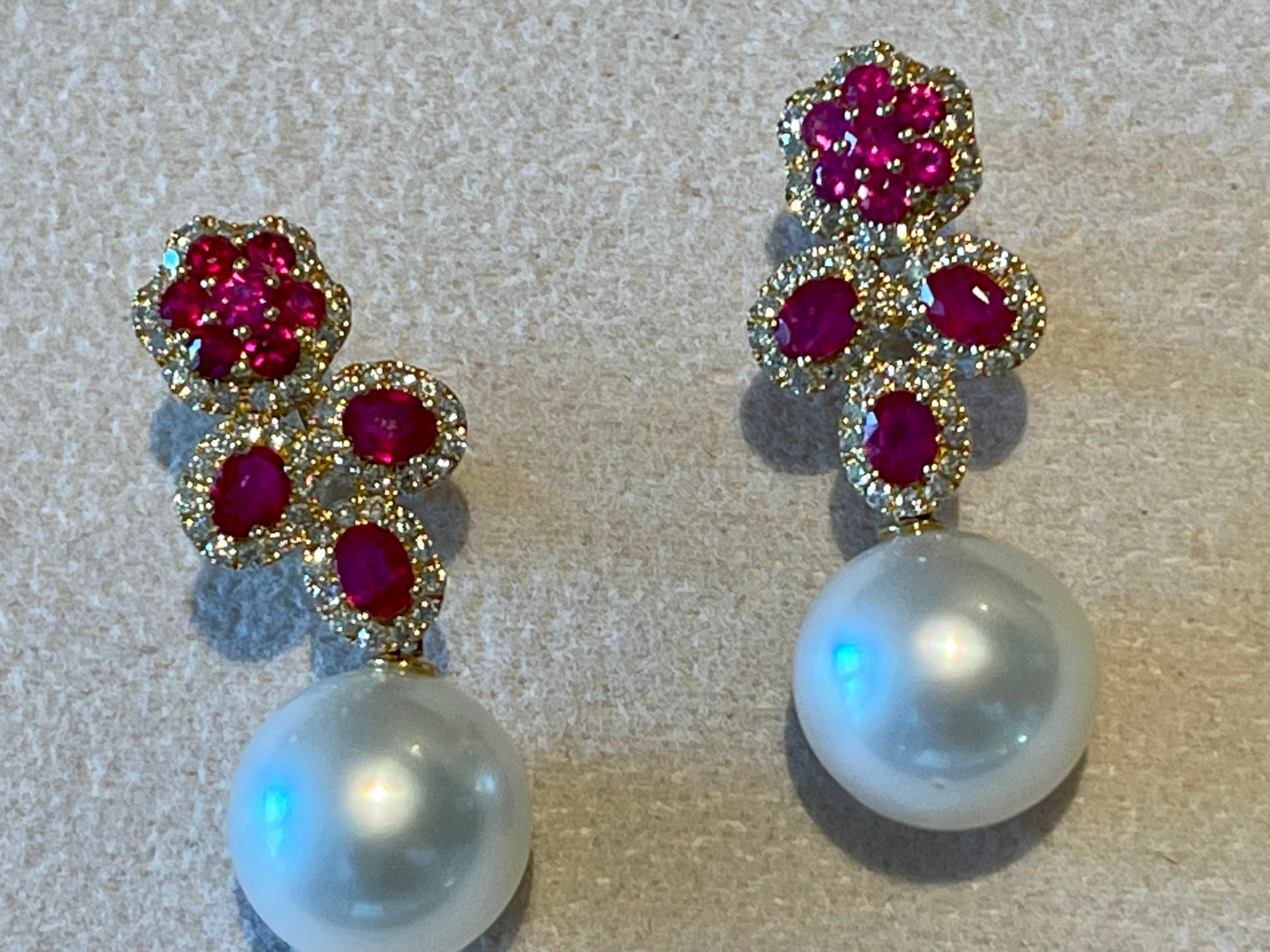 A pair of 18 K yellow Gold Diamond Ruby South Sea Pearl earrings For Sale 3