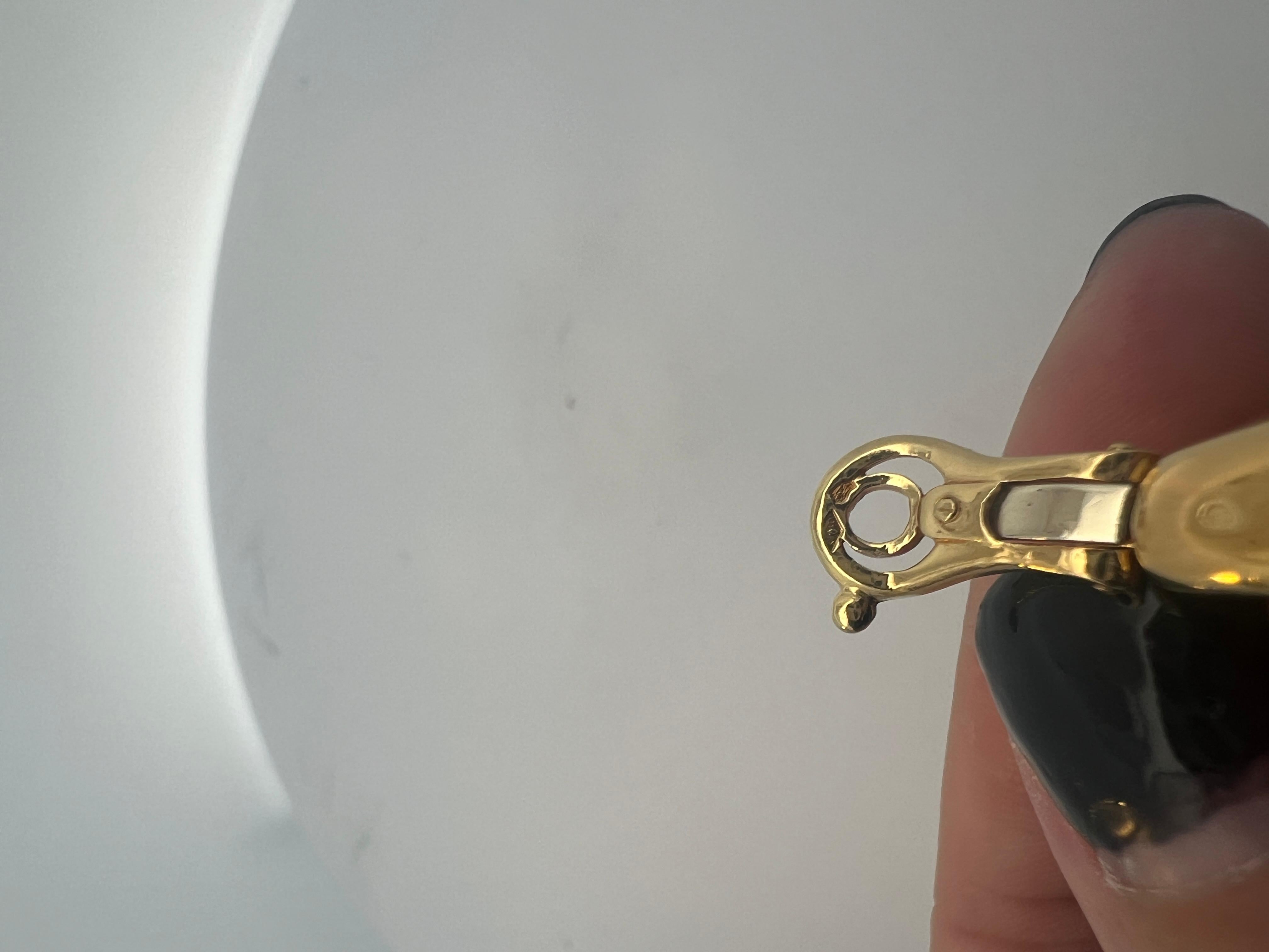 A pair of 18 karat yellow gold ear clips by Hermès. For Sale 12
