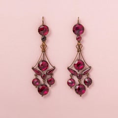 A pair of 18k Gold Girandole Earrings with Garnets
