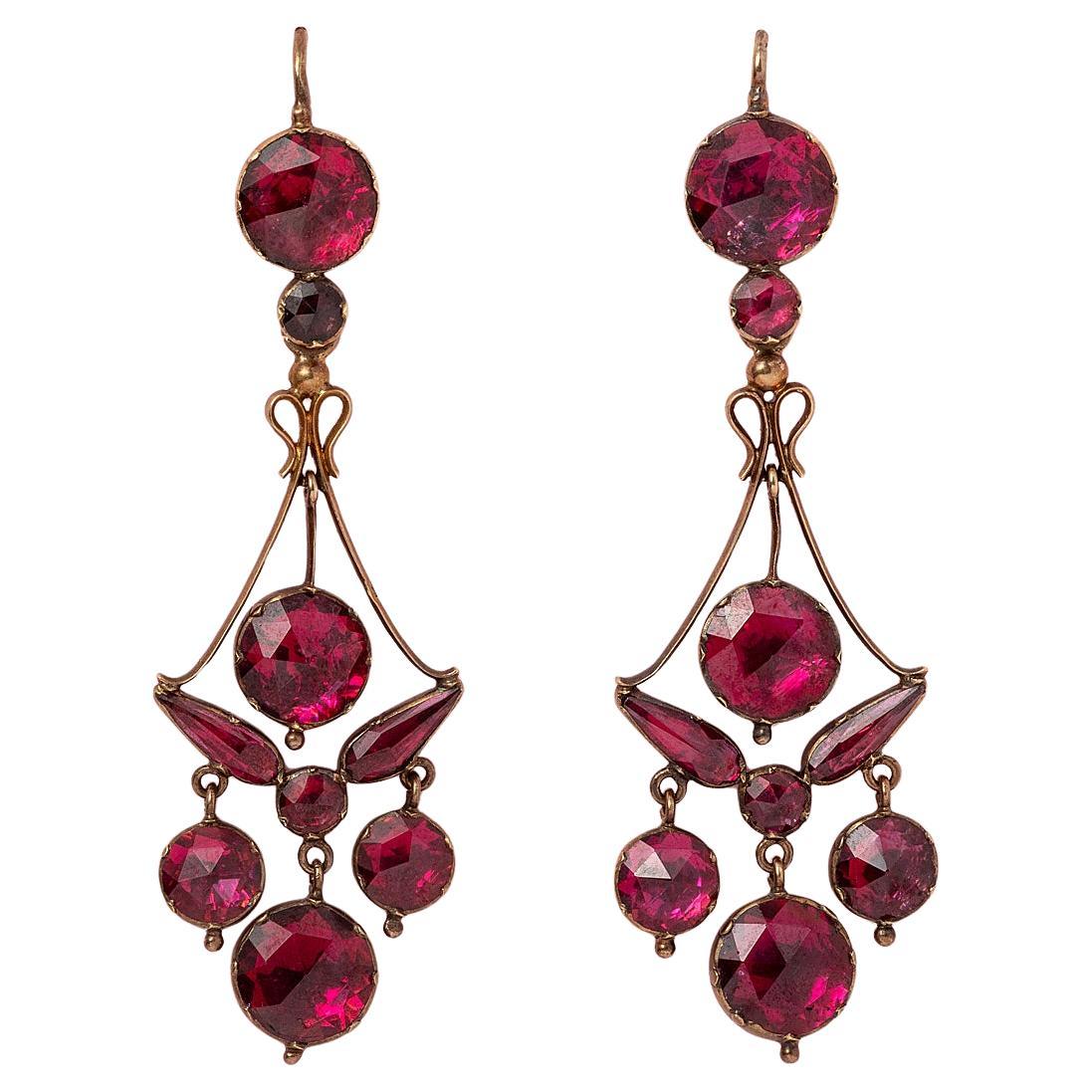 A pair of 18k Gold Girandole Earrings with Garnets For Sale