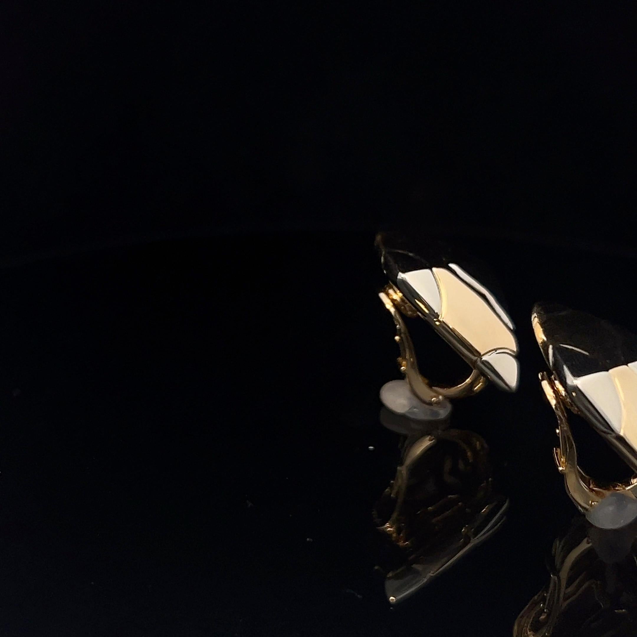 A pair of 18k white and yellow gold 