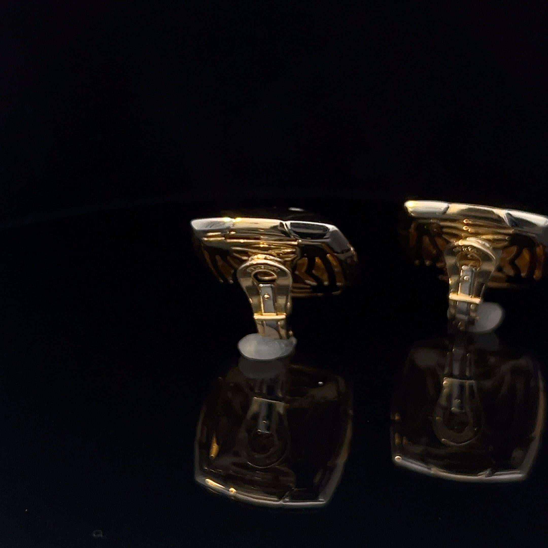 A pair of 18k white and yellow gold 