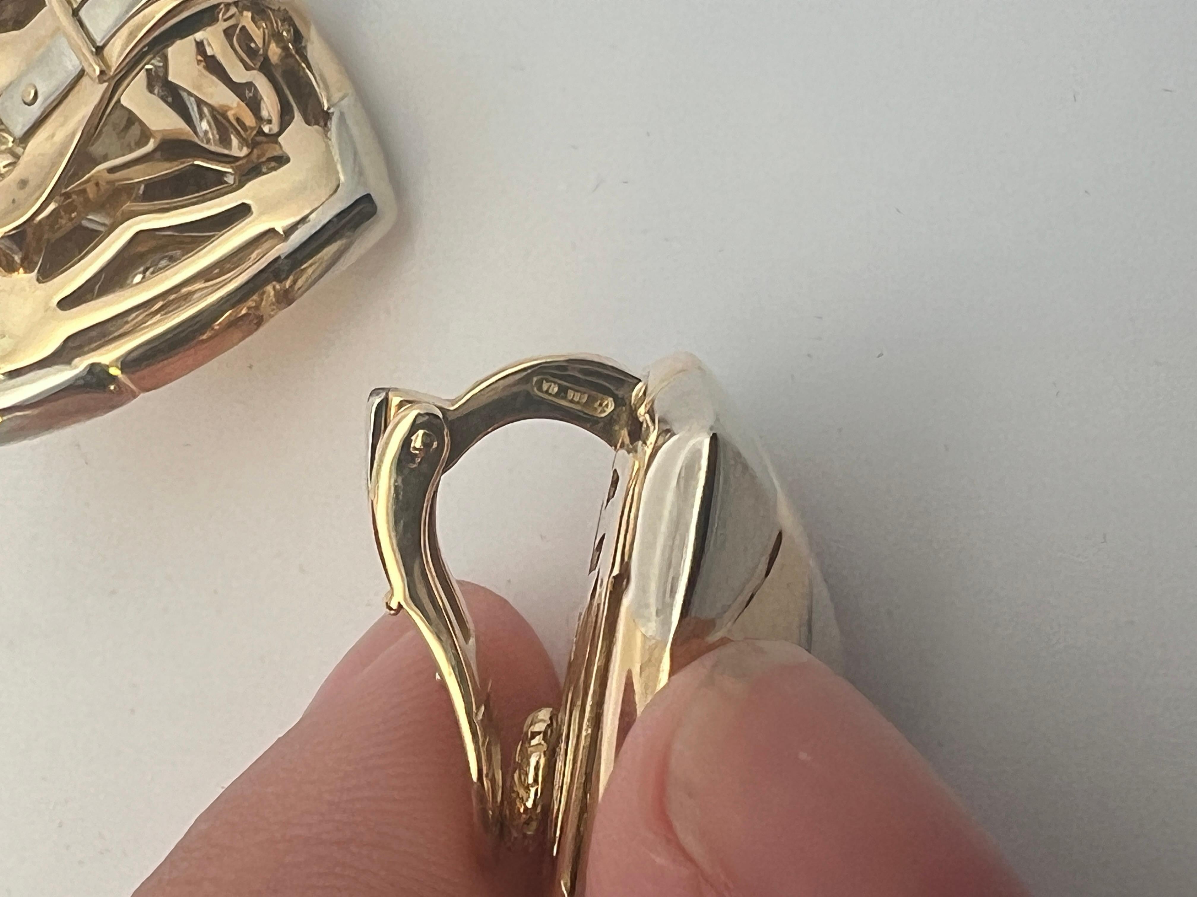 A pair of 18k white and yellow gold 