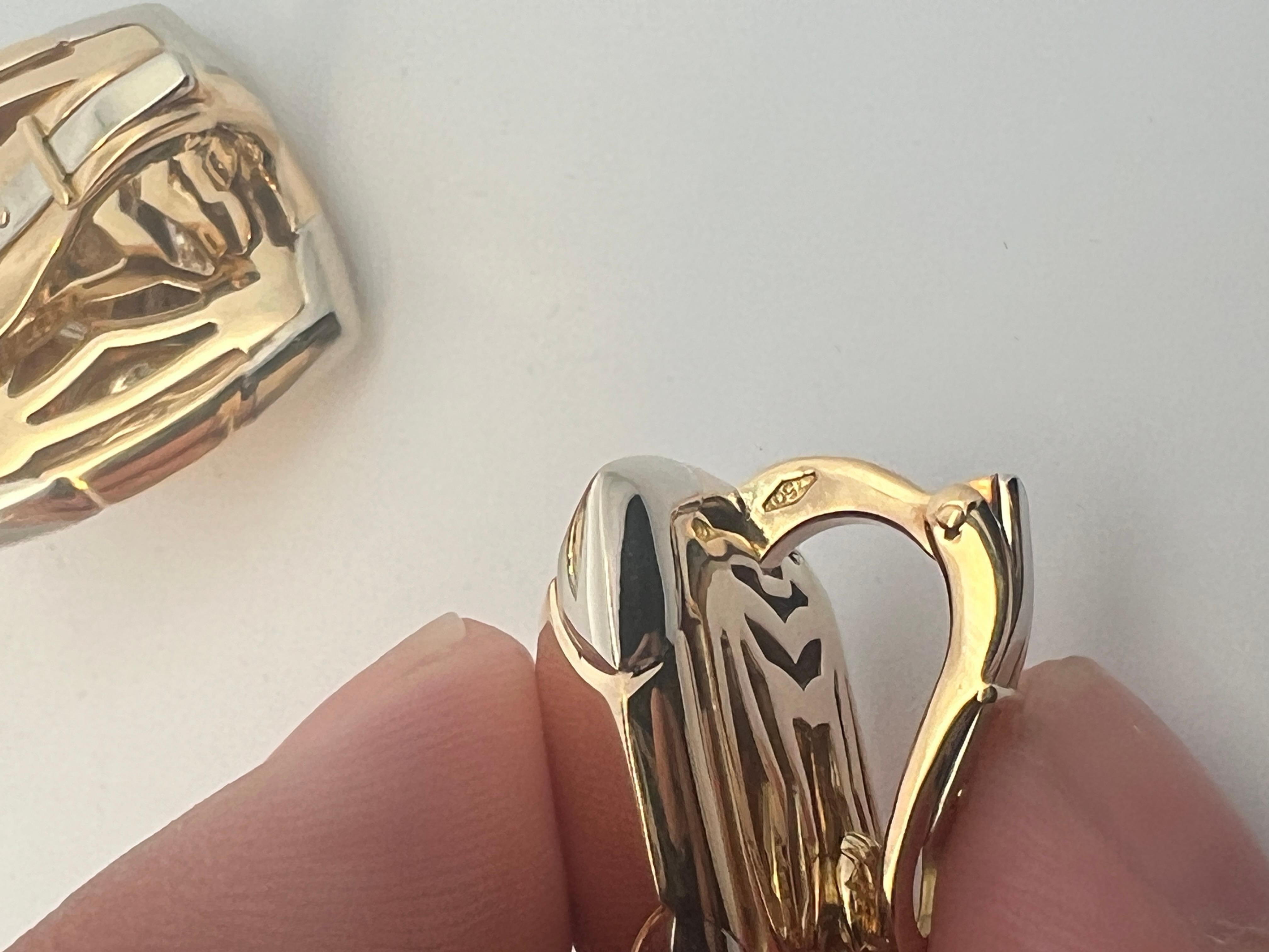 A pair of 18k white and yellow gold 