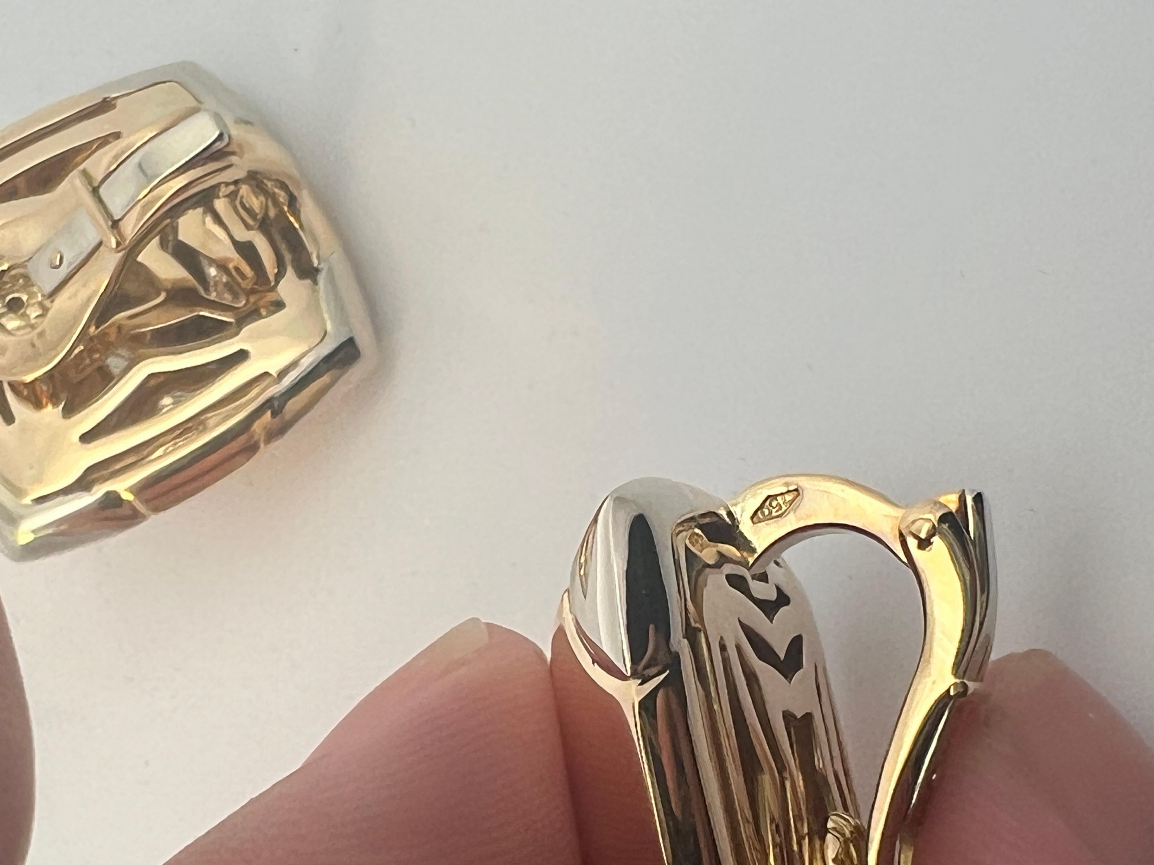 A pair of 18k white and yellow gold 
