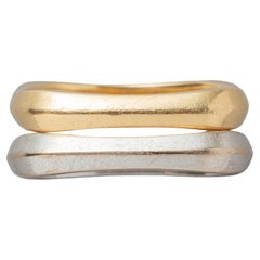 Un par de anillos cuadrados de oro blanco y amarillo de 18 quilates de Fred Paris