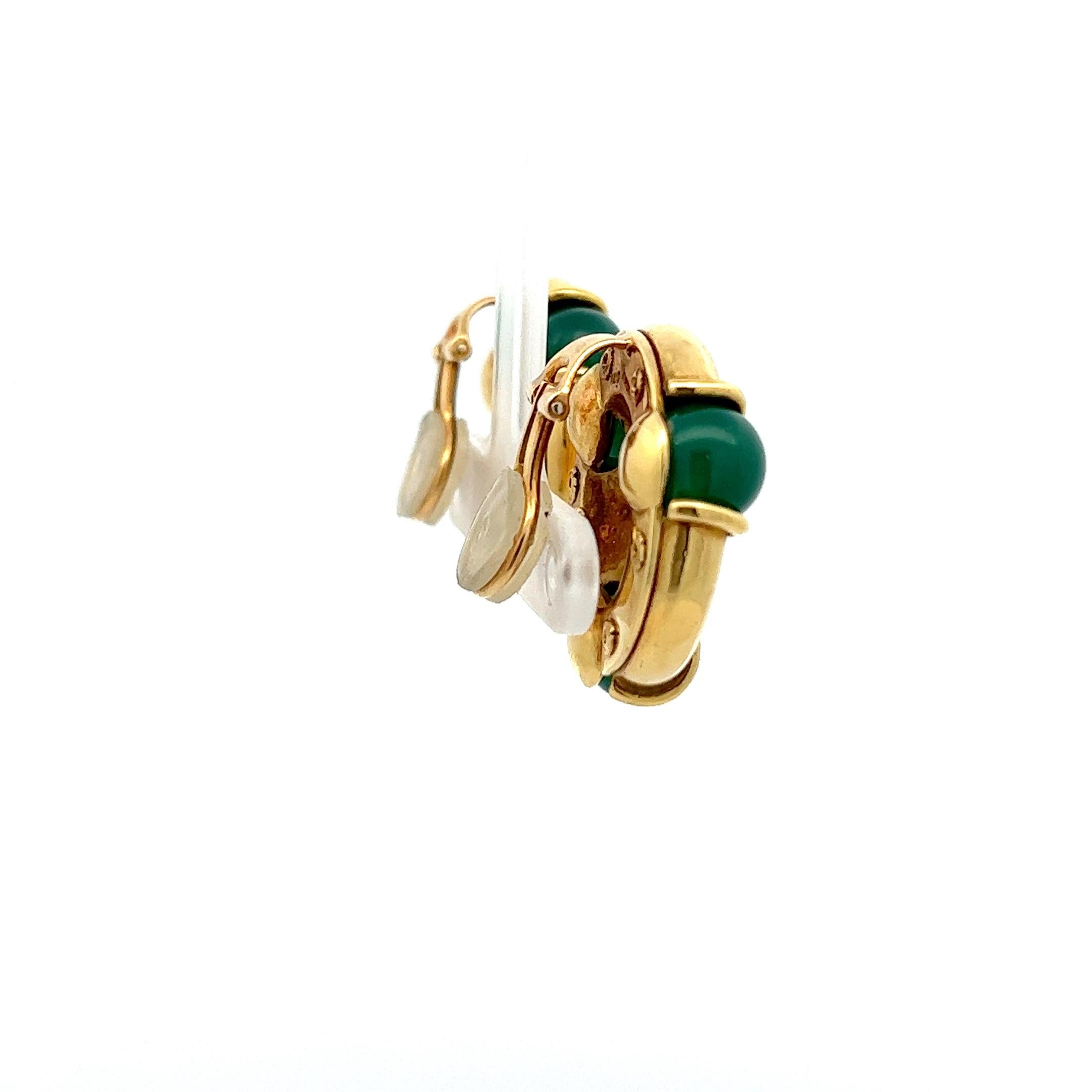 Bead A pair of 18k yellow gold and chrysoprase ear clips by Kiki McDonough.