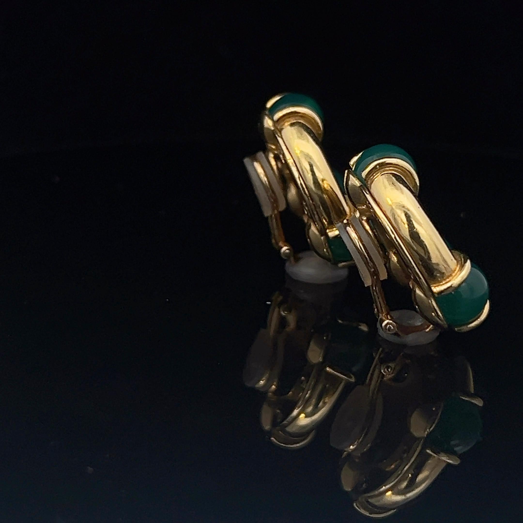 A pair of 18k yellow gold and chrysoprase ear clips by Kiki McDonough. 2