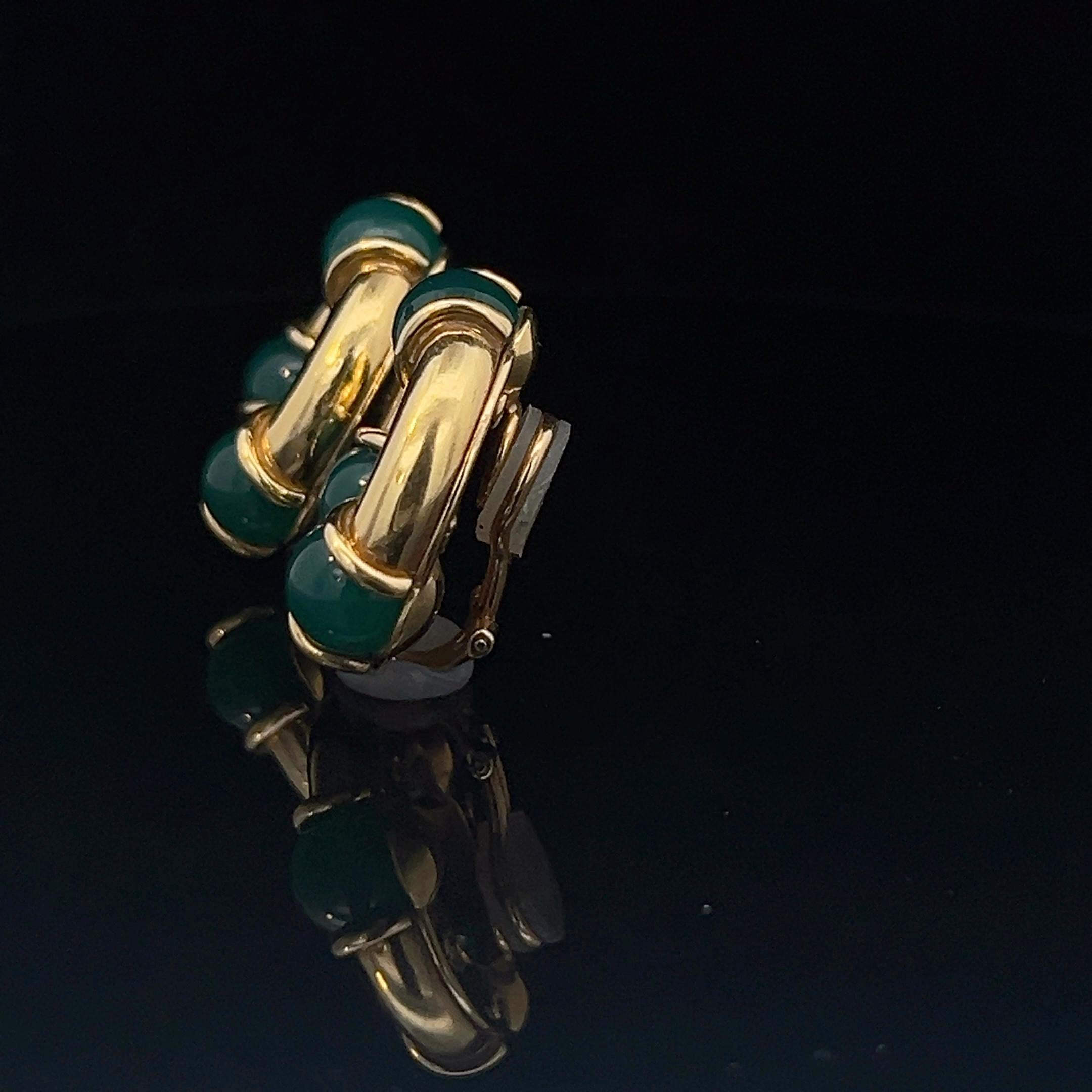 A pair of 18k yellow gold and chrysoprase ear clips by Kiki McDonough. 4