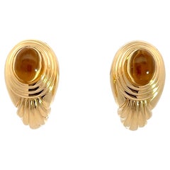 A pair of 18k yellow gold and Citrine ear clips by Boucheron