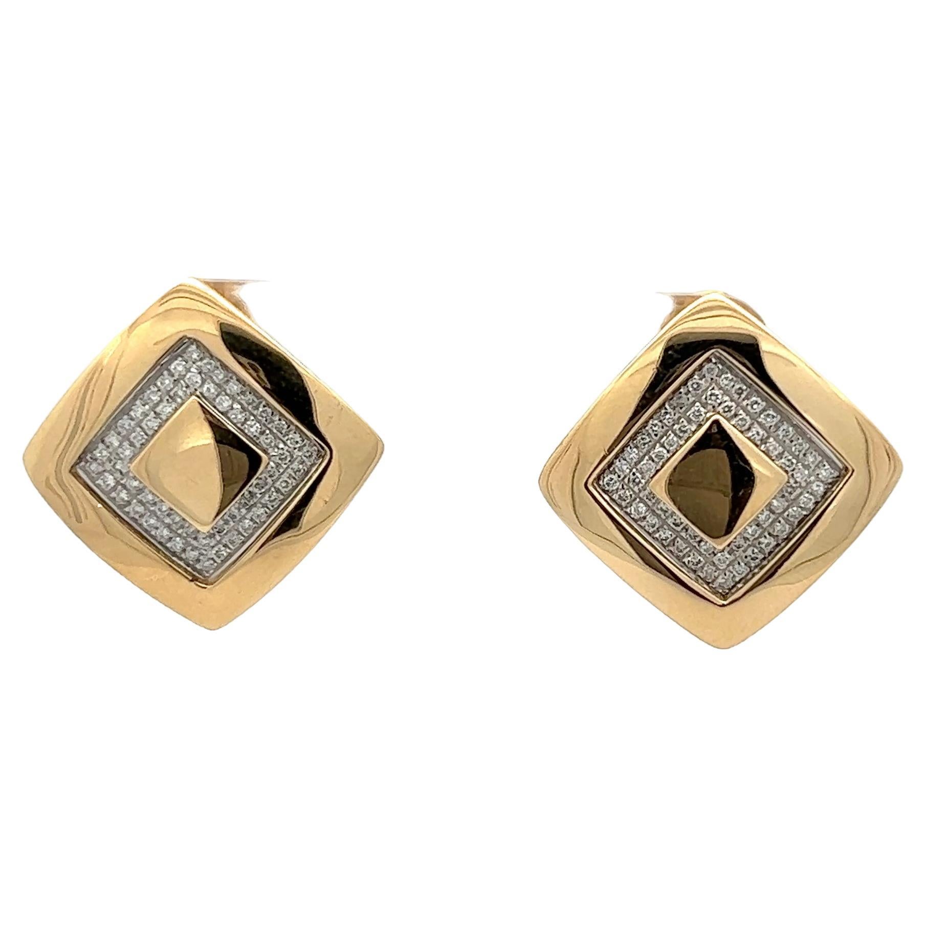 A pair of 18k yellow gold and diamond earrings by Versace. For Sale