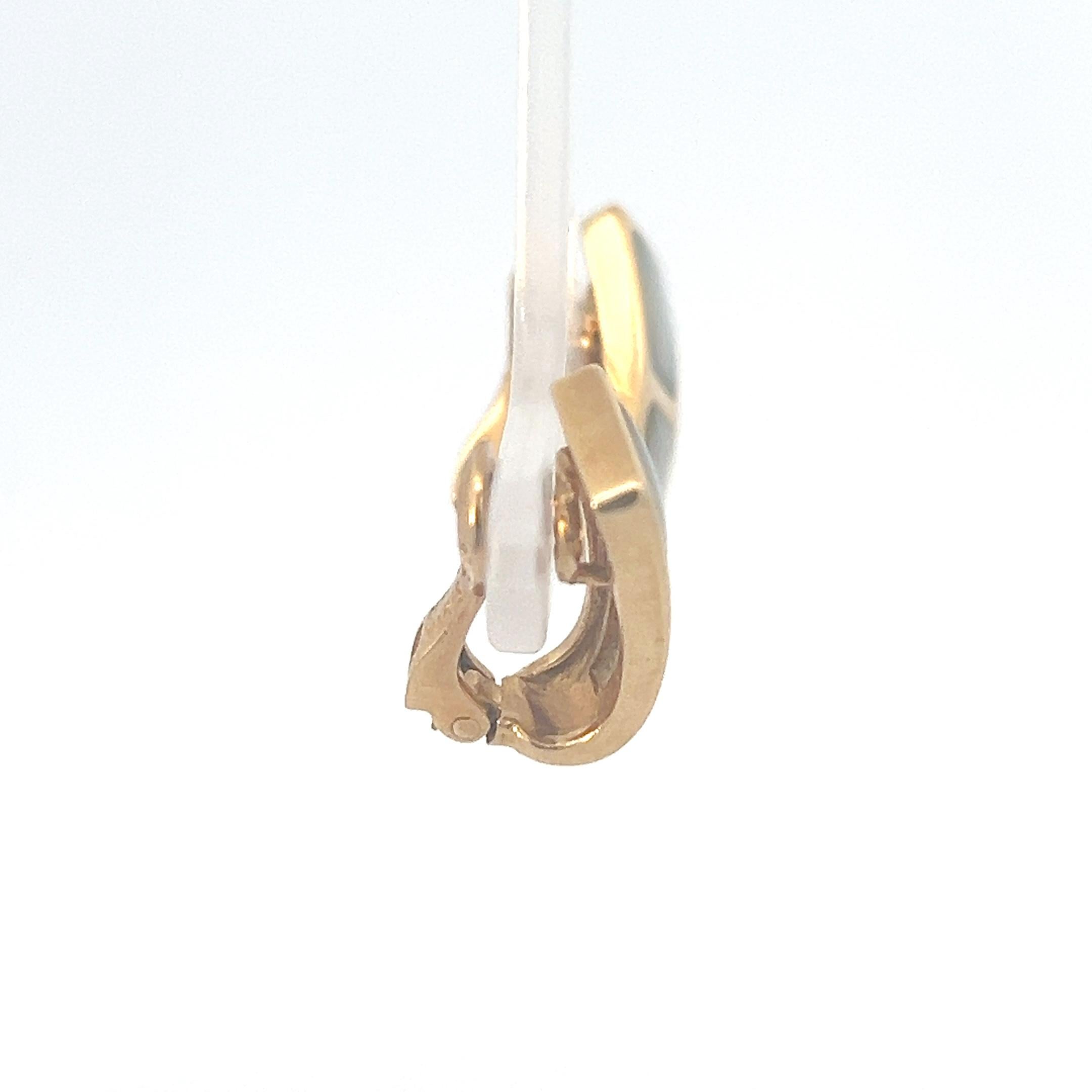Women's A pair of 18k yellow gold and Mother-of-Pearl ear clips by Mauboussin