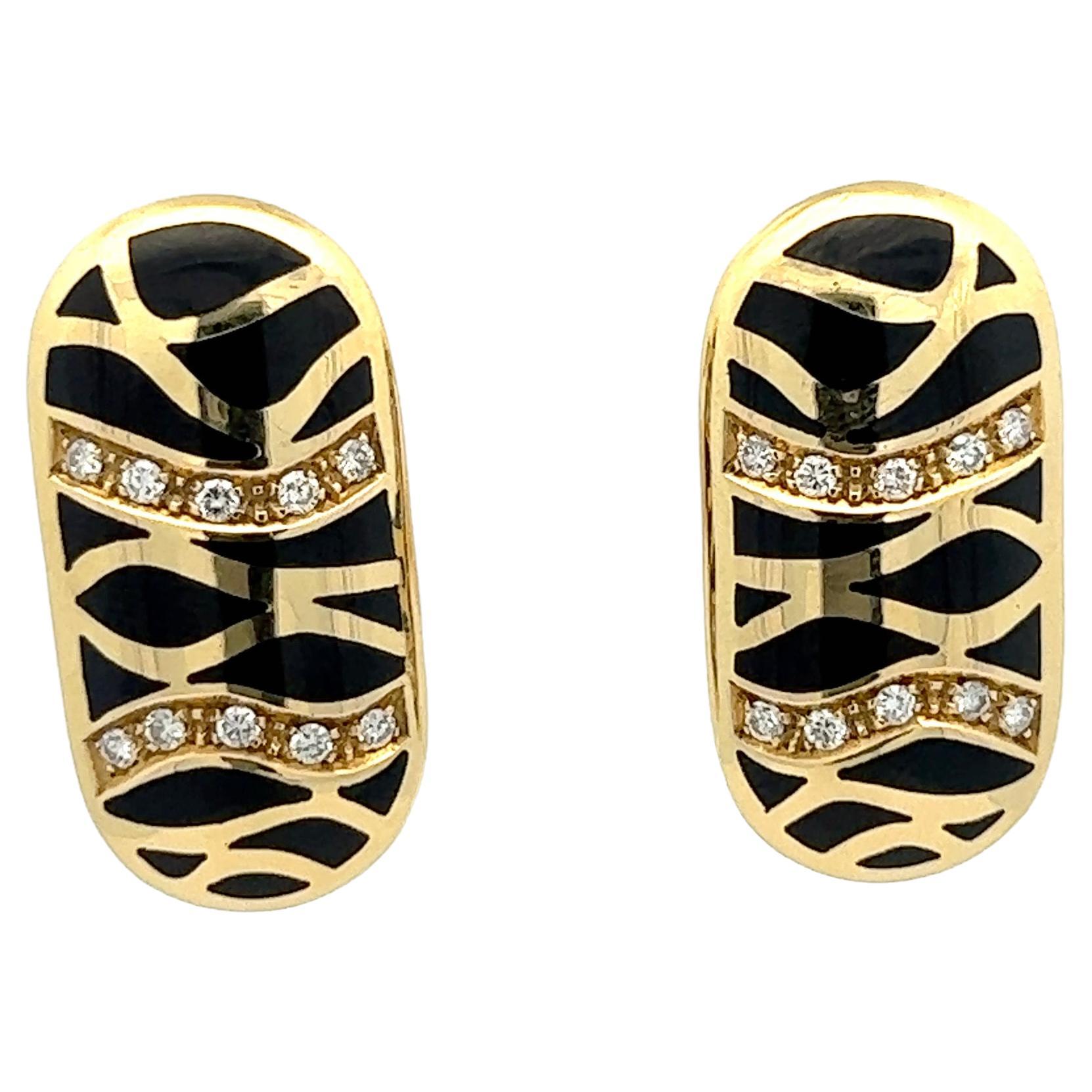 A pair of 18k yellow gold, Diamond and black enamel ear clips by Illario. For Sale