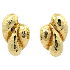 Vintage A pair of 18k yellow gold ear clips by Henry Dunay.