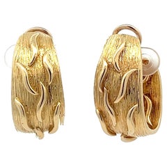 A pair of 18k yellow gold ear clips by Kutchinsky.