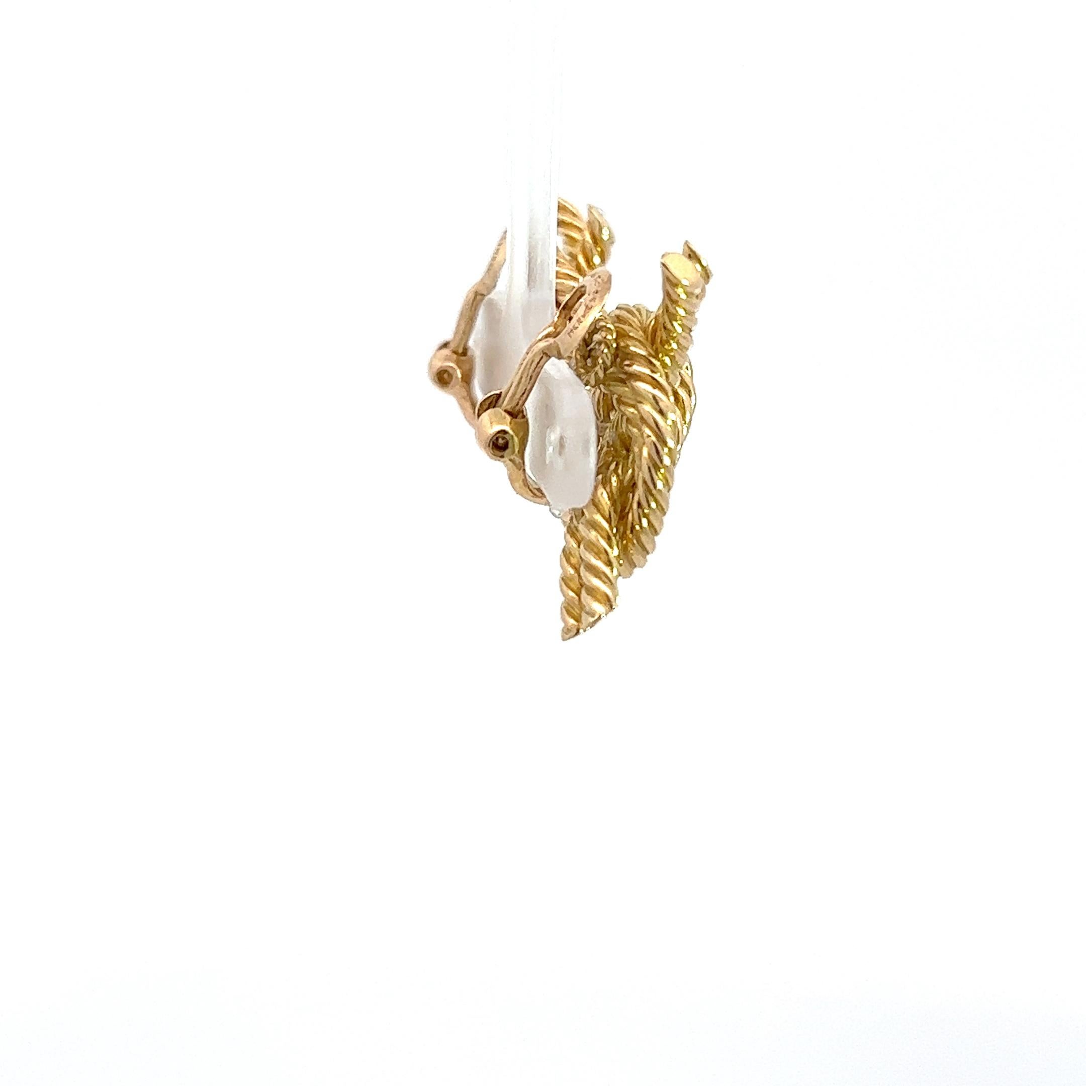 Women's A pair of 18k yellow gold knot ear clips by Georges L'enfant for Hermès