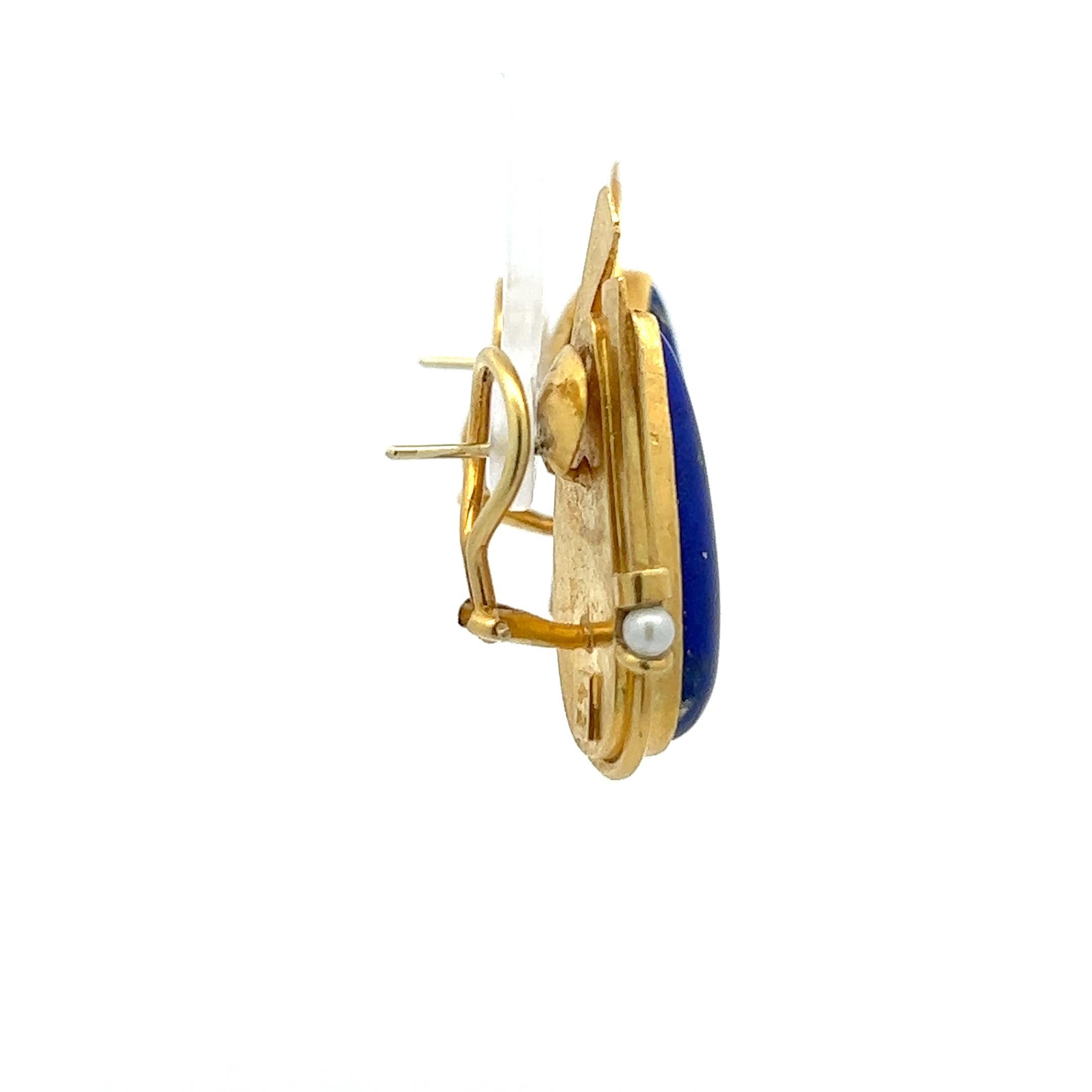 Cabochon A pair of 18k yellow gold, lapis lazuli and pearl earrings by Erté.